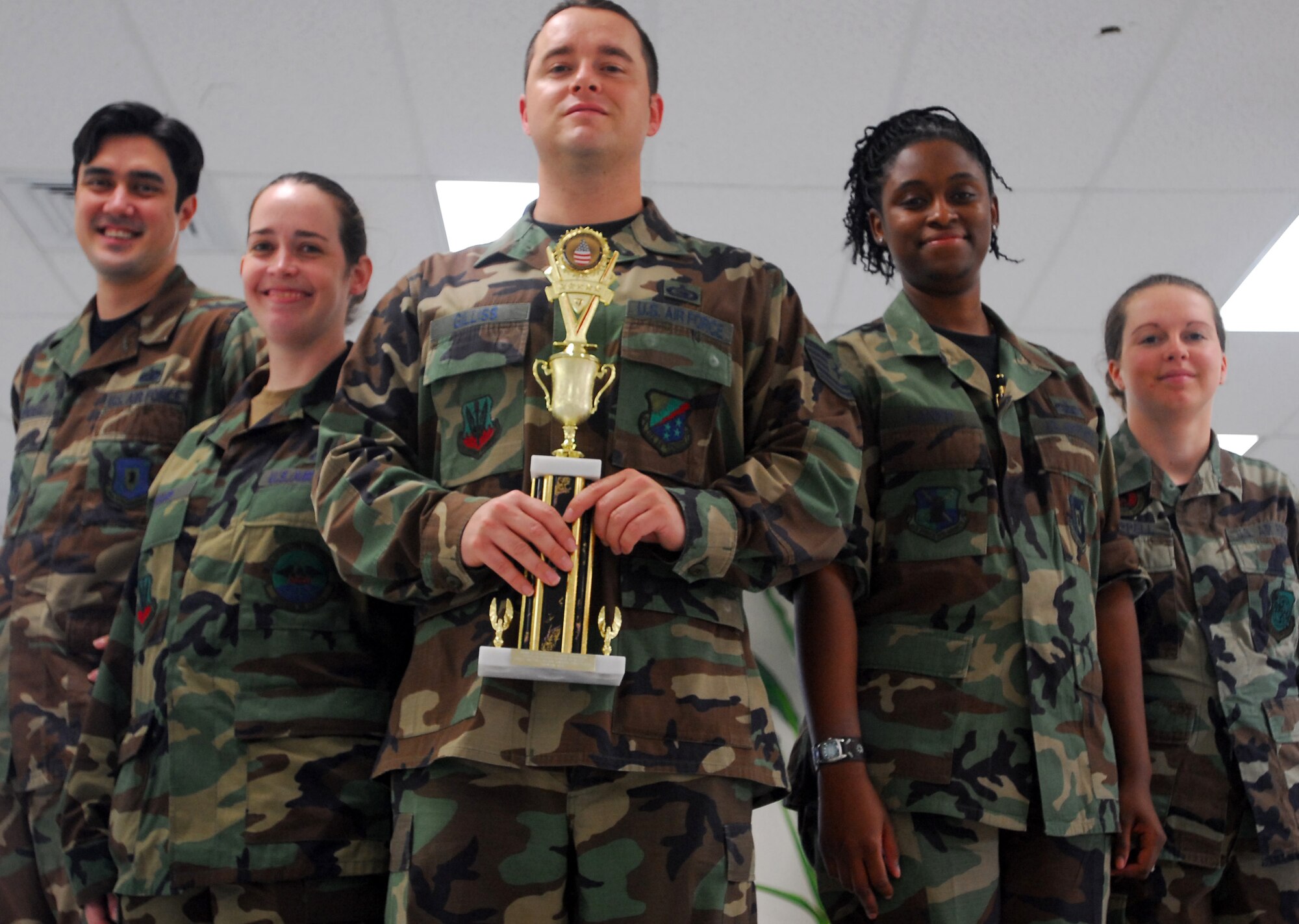 L-R, Tech. Sgt. John Riendeau, 692nd Intelligence Group, Staff Sgt. Malissa Swihart, 352nd Intelligence Operations Squadron, Tech. Sgt. Kevin Gilliss, PACAF, Hickam Blood Drive Coordinator, Tech. Sgt. Angie Lanier, 692nd IG, Airman 1st Class Ashley Chappell, 15th Operations Support Squadron, unit blood drive managers, helped Hickam AFB earn  the 2nd place Installation Award for the Armed Forces Blood Program, Tripler Blood Donor Center. To do this, the team collected about 440 units of blood last year. Photo by Staff Sgt. Erin Smith