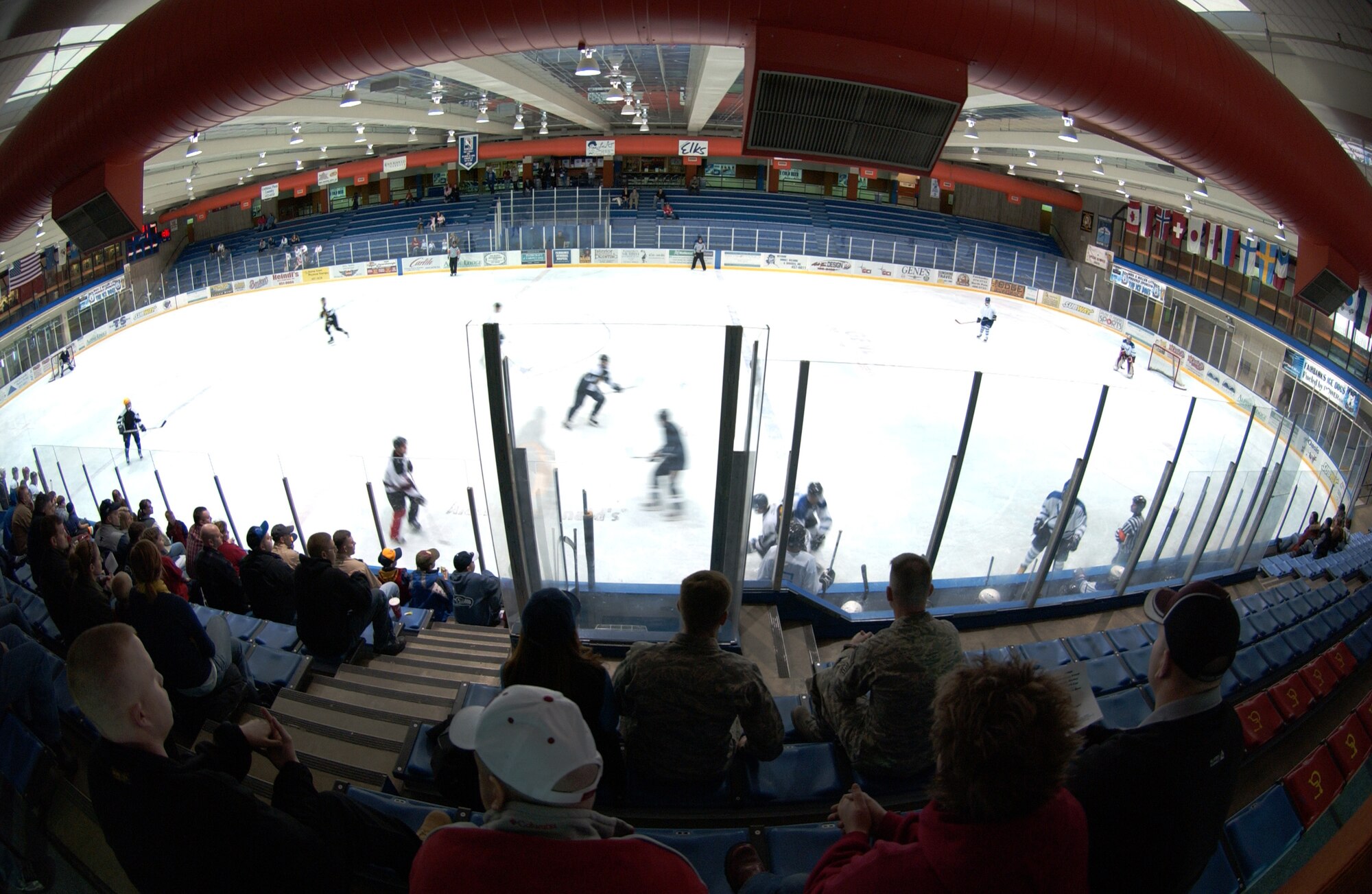 EIELSON AIR FORCE BASE, Alaska - Military members watch the Commander's Cup hockey game Feb. 23 at the Big Dipper Ice Arena. The Eielson Icemen faced off against the Fort Wainwright Grizzlies in the 12th annual Commander's Cup, which was a free game for military families to enjoy. (U.S. Air Force Photo/Airman 1st Class Jonathan Snyder)