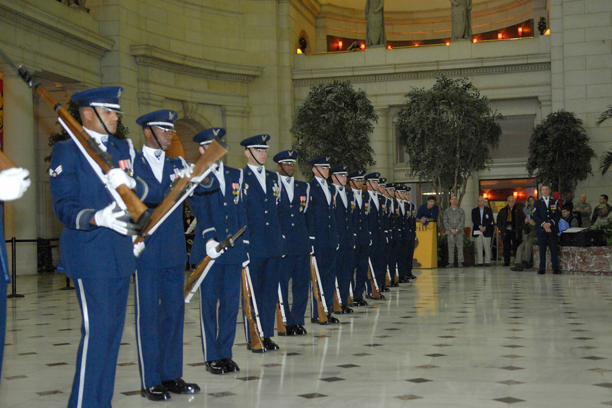 Air Force Honor Guard Drill Team members perform their new line drill sequence that represents the heritage of the Air Force Feb. 21 at Union Station in Washington, D.C. The unveiling drill is the first drill of the year and the formal presentation of the 2008 team to Air Force leadership and the general public. The drill team is the traveling component of the Air Force Honor Guard and tours Air Force bases worldwide showcasing the precision of today's Air Force to recruit, retain and inspire Airmen for the Air Force mission. (U.S. Air Force photo/Senior Airman Sean Adams) 
