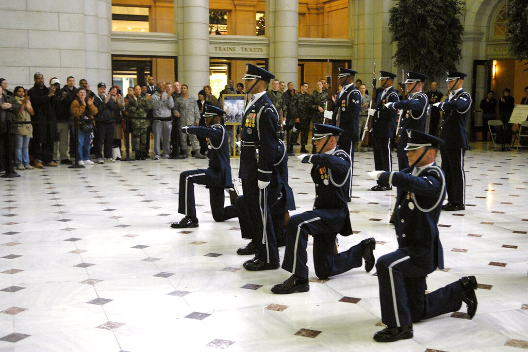 Air Force Honor Guard Drill Team members perform their new drill sequence during their unveiling performance Feb. 21 at Union Station in Washington, D.C. The unveiling drill is the first drill of the year and the formal presentation of the 2008 team to Air Force leadership and the general public. The drill team is the traveling component of the Air Force Honor Guard and tours Air Force bases worldwide showcasing the precision of today's Air Force to recruit, retain and inspire Airmen for the Air Force mission. (U.S. Air Force photo/Senior Airman Sean Adams) 