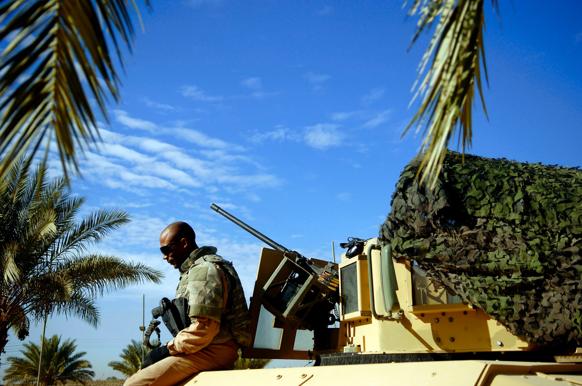 Senior Airman Juwan Young waits on his tactical vehicle Feb. 23 prior to patrolling the east and west section of Rasheed, Iraq. Airman Young is deployed to Det. 3, 732nd Expeditionary Security Forces Squadron at Sather Air Base, Iraq. He is from the 2nd Security Forces Squadron from Barksdale Air Force Base, La. (U.S. Air Force photo/Master Sgt. Andy Dunaway) 