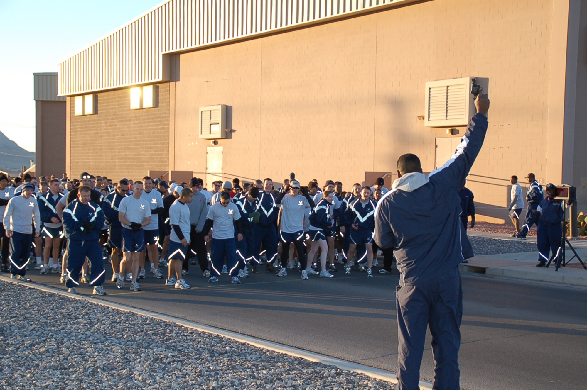 NELLIS AIR FORCE BASE, Nev.—Nellis Airmen line up at the starting line of the 2008 Nellis Sports and Fitness Center “Sweetheart Run” held here, Feb. 15. More than 600 Airmen participated in the 5K run. (U.S. Air Force photo by TSgt John Bosworth)