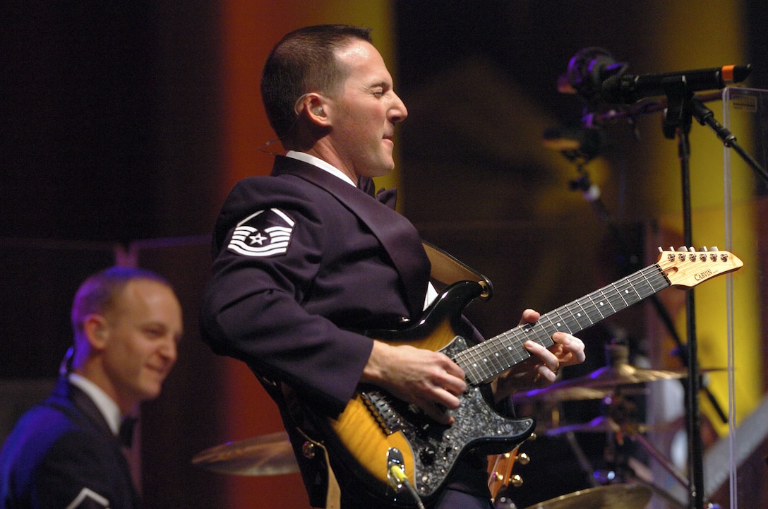 Guitarist Master Sgt. Matt Ascione jams with the U.S. Air Force Band's ensemble Silver Wings at DAR Constitution Hall on February 10. Silver Wings helped kick off the first concert of the USAF Band's 2008 Guest Artist Series. The concert later featured the country music legend Restless Heart with the USAF Symphony Orchestra. (Photo courtesy of Chip Feise)