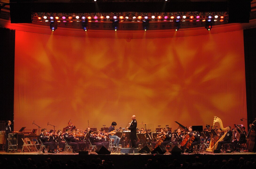 Ukulele virtuoso Jake Shimabukuro makes beautiful music with the U.S. Air Force Band on February 17. The concert featuring Shimabukuro was part of the USAF Band's 2008 Guest Artist Series at DAR Constitution Hall in Washington, D.C. (Photo courtesy of Chip Feise)