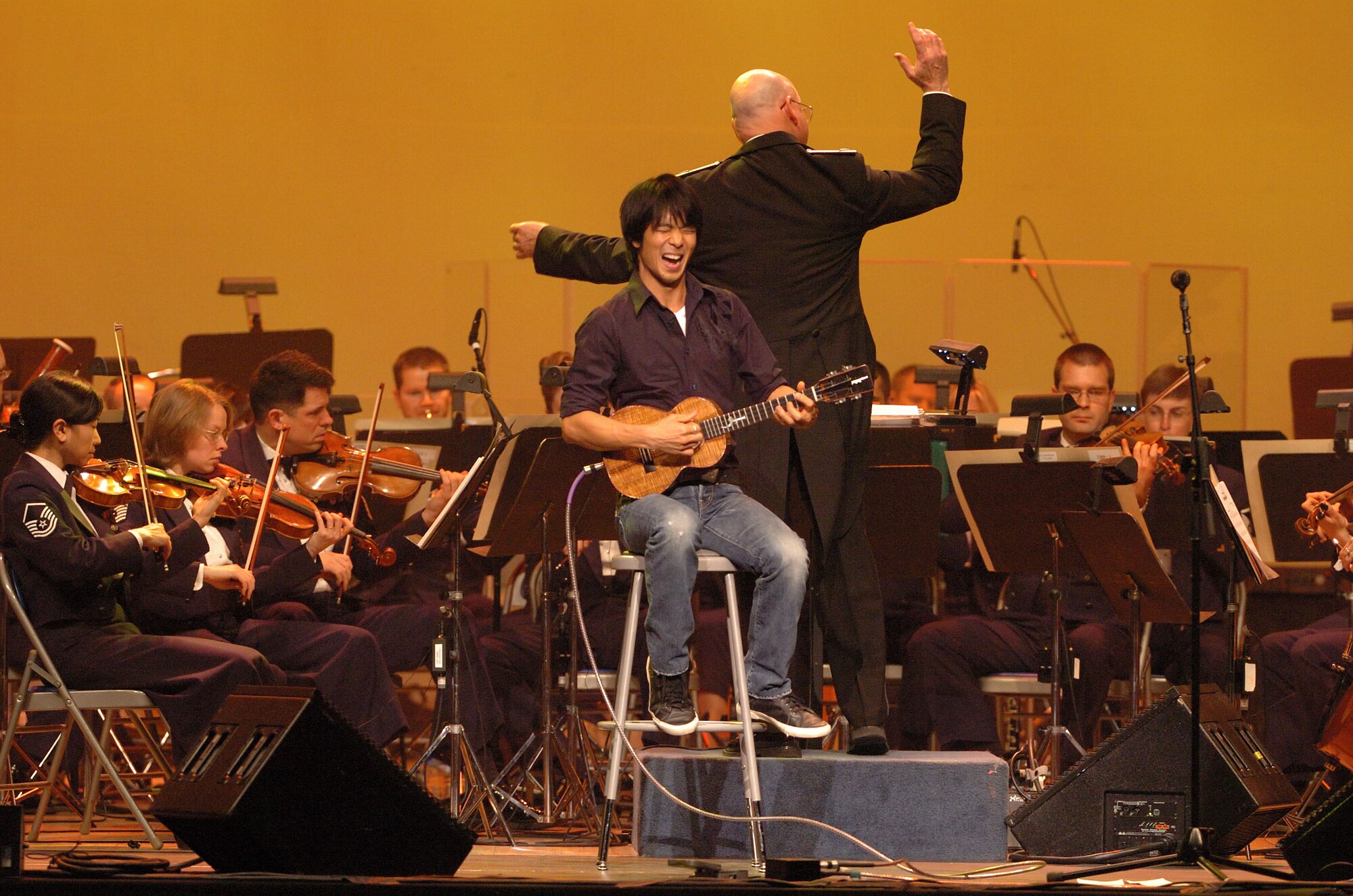Ukulele virtuoso Jake Shimabukuro makes beautiful music with the U.S. Air Force Band on February 17. The concert featuring Shimabukuro was part of the USAF Band's 2008 Guest Artist Series at DAR Constitution Hall in Washington, D.C. (Photo courtesy of Chip Feise)