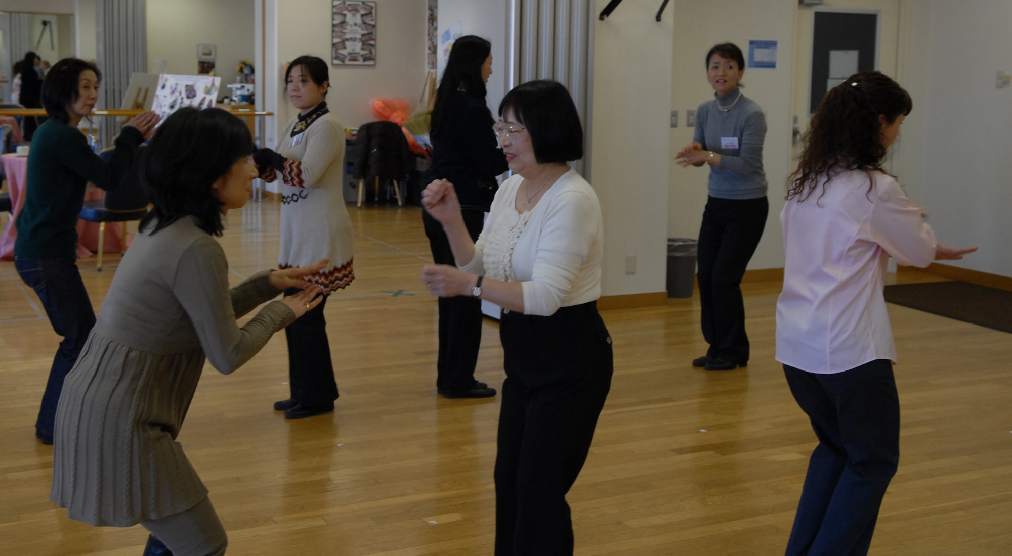 Spouses from Yokota Air Base and Iruma Air base swing dance suring the Bilateral event here Feb. 13. The spouses meet every quarter to exchange culturals and help strengthen our bonds here in Japan with events like theses. (U.S. Air Force photo by Airman 1st Class Eric Summers)