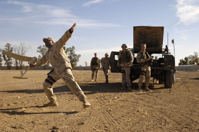 Staff Sgt. Vernon Williams prepares to launch a Raven B into flight on Kirkuk Regional Air Base, Iraq, Nov. 16, 2007. Sergeant Williams is an RQ-11 B Small Unmanned Aircraft System (Raven B) operator assigned to 506th Expeditionary Security Forces Squadron. (U.S. Air Force photo/Staff Sgt. Angelique Perez)