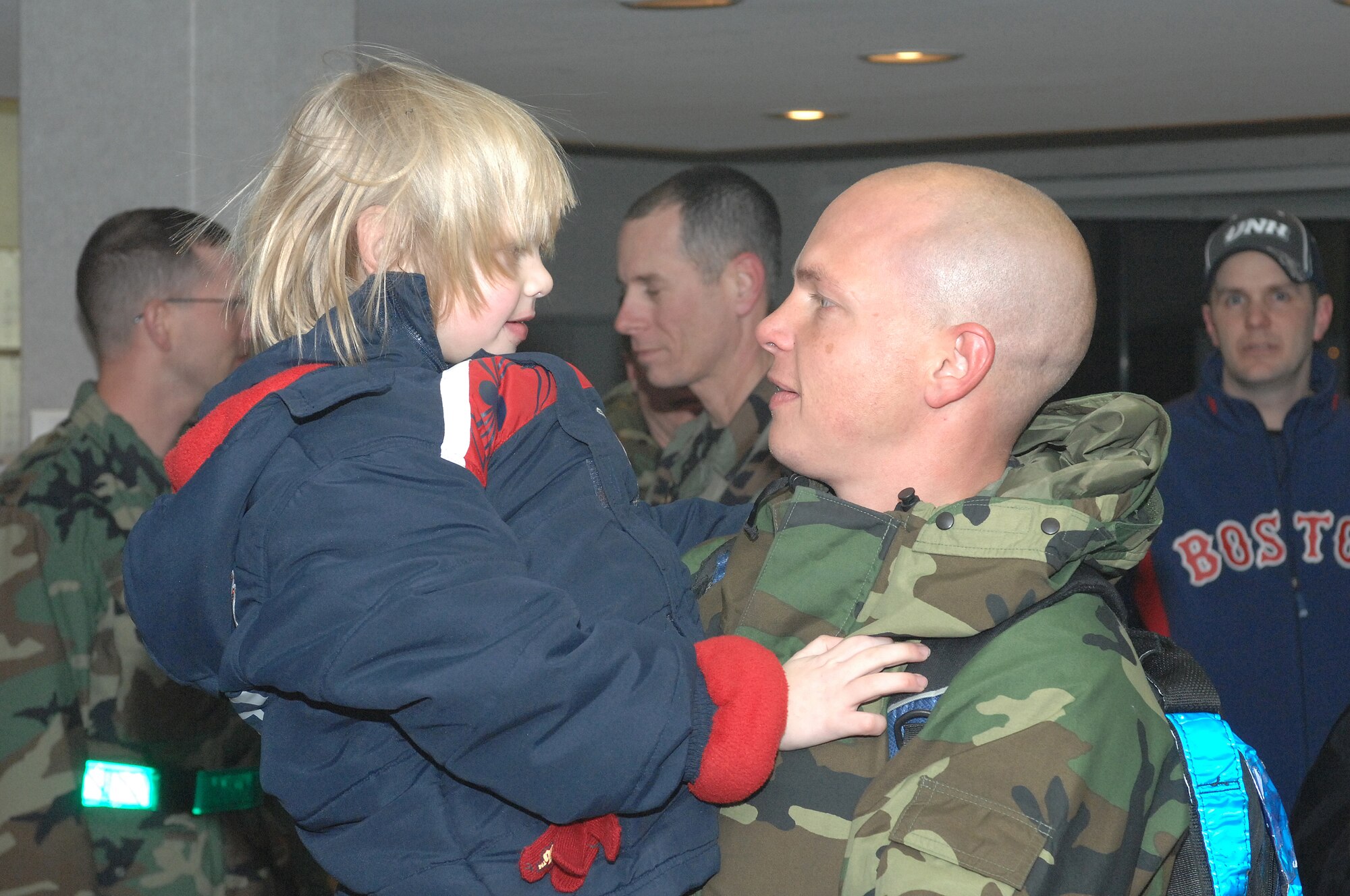 WHITEMAN AIR FORCE BASE, Mo. – Tech. Sgt. Todd Halvorsen, 509th MXS hugs his son Leyten at base operations upon returning from deployment Feb. 26. (U.S. Air Force photo/Tech. Sgt. Samuel A. Park) 