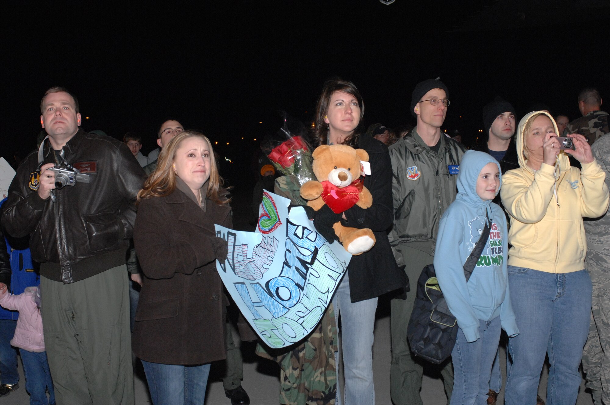 WHITEMAN AIR FORCE BASE, Mo. – Spouses, children and Airmen welcome the 509th Bomb Wing troops on their return from deployment Feb. 26. (U.S. Air Force photo/Tech. Sgt. Samuel A. Park) 