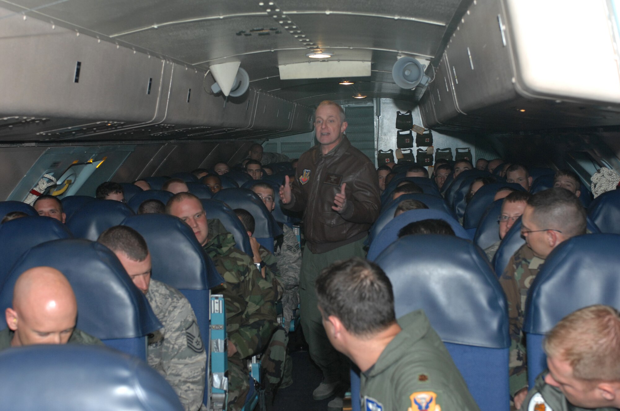 WHITEMAN AIR FORCE BASE, Mo. –  Brig. Gen. Garrett Harencak, 509th Bomb Wing commander, briefs the troops prior to exiting a C-5 Feb. 26. The troops are returning from a deployment to Andersen Air Force Base, Guam. (U.S. Air Force photo/Tech. Sgt. Samuel A. Park) 