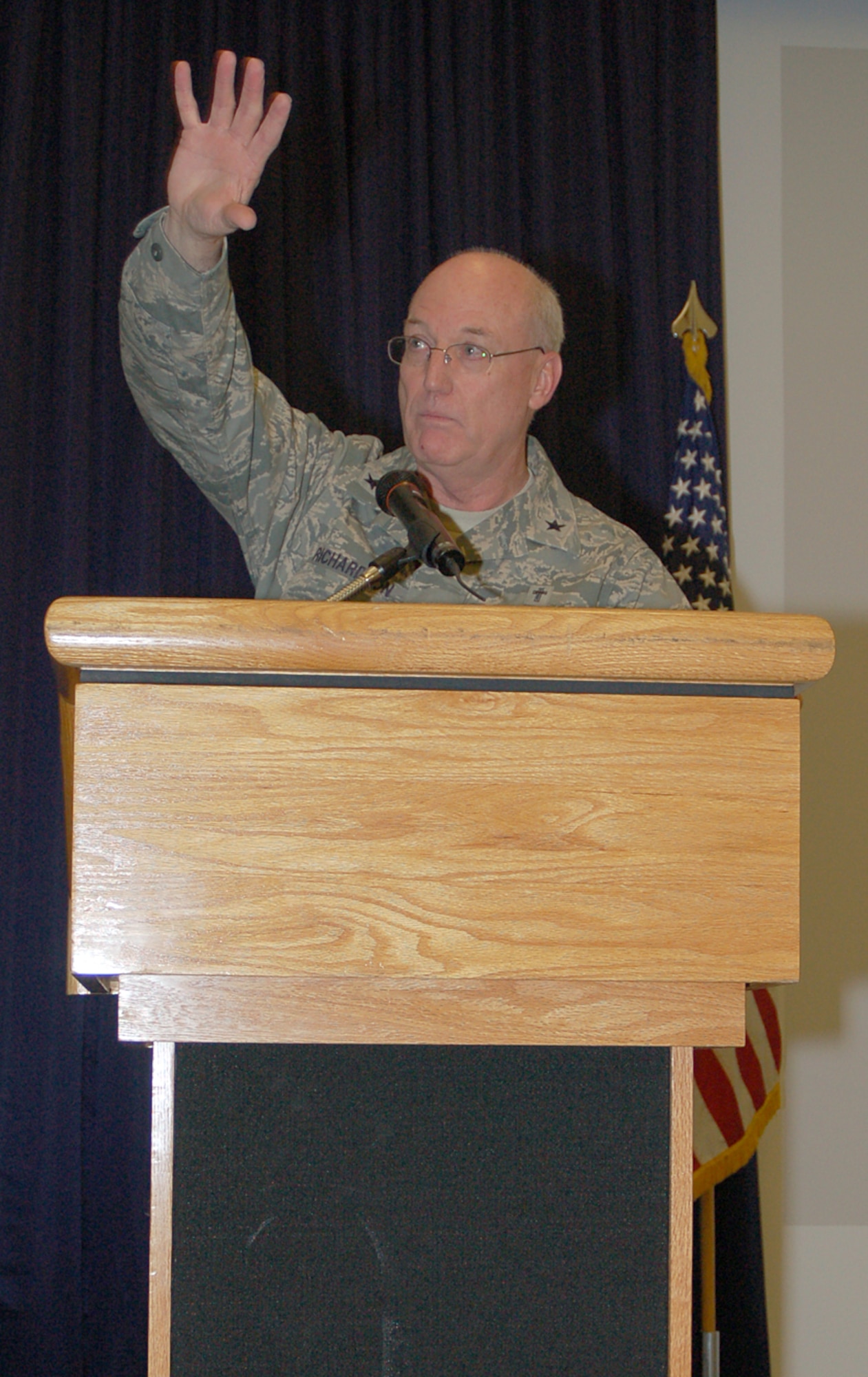 Chaplain (Brig. Gen.) Cecil Richardson, Air Force deputy chief of chaplains, addresses more than 200 audience members at the National Prayer Luncheon at Dover Air Force Base Feb. 26. General Richardson’s oversight helps chaplains worldwide provide opportunities for the free exercise of religion to all Air Force people and their families. (U.S. Air Force photo/Master Sgt. Melissa Phillips)