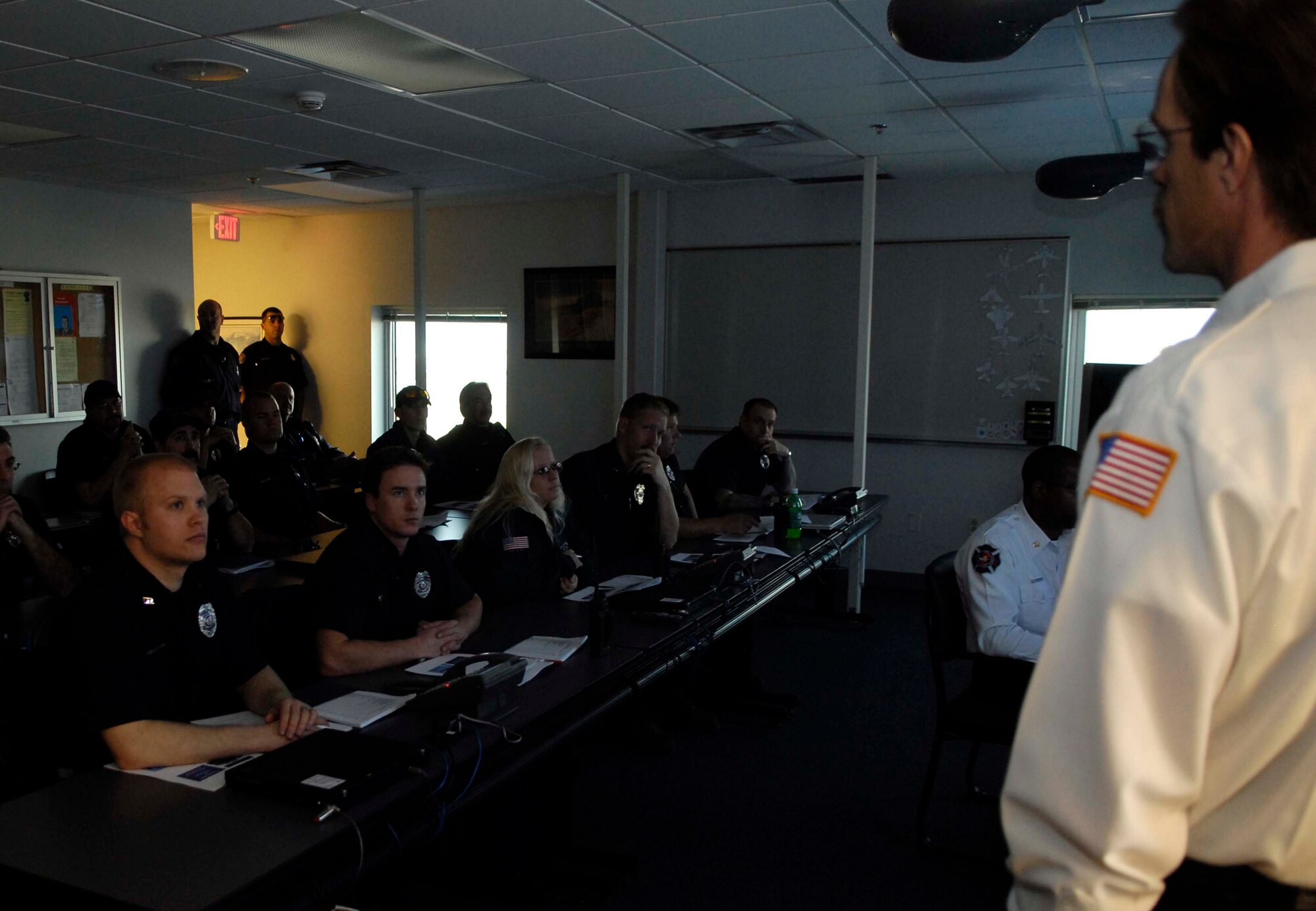 BUCKLEY AIR FORCE BASE, Colo. -- Assistant Chief Steven Zigan, Buckley Air Force Base Fire Department, conducts a training class on F-16 mutual aid responses for the Aurora and Sable-Altura Fire Departments, Aurora, Colo., on support of interagency fire department training here Feb. 21. (U.S. Air Force photo by Senior Airman Steven Czyz)