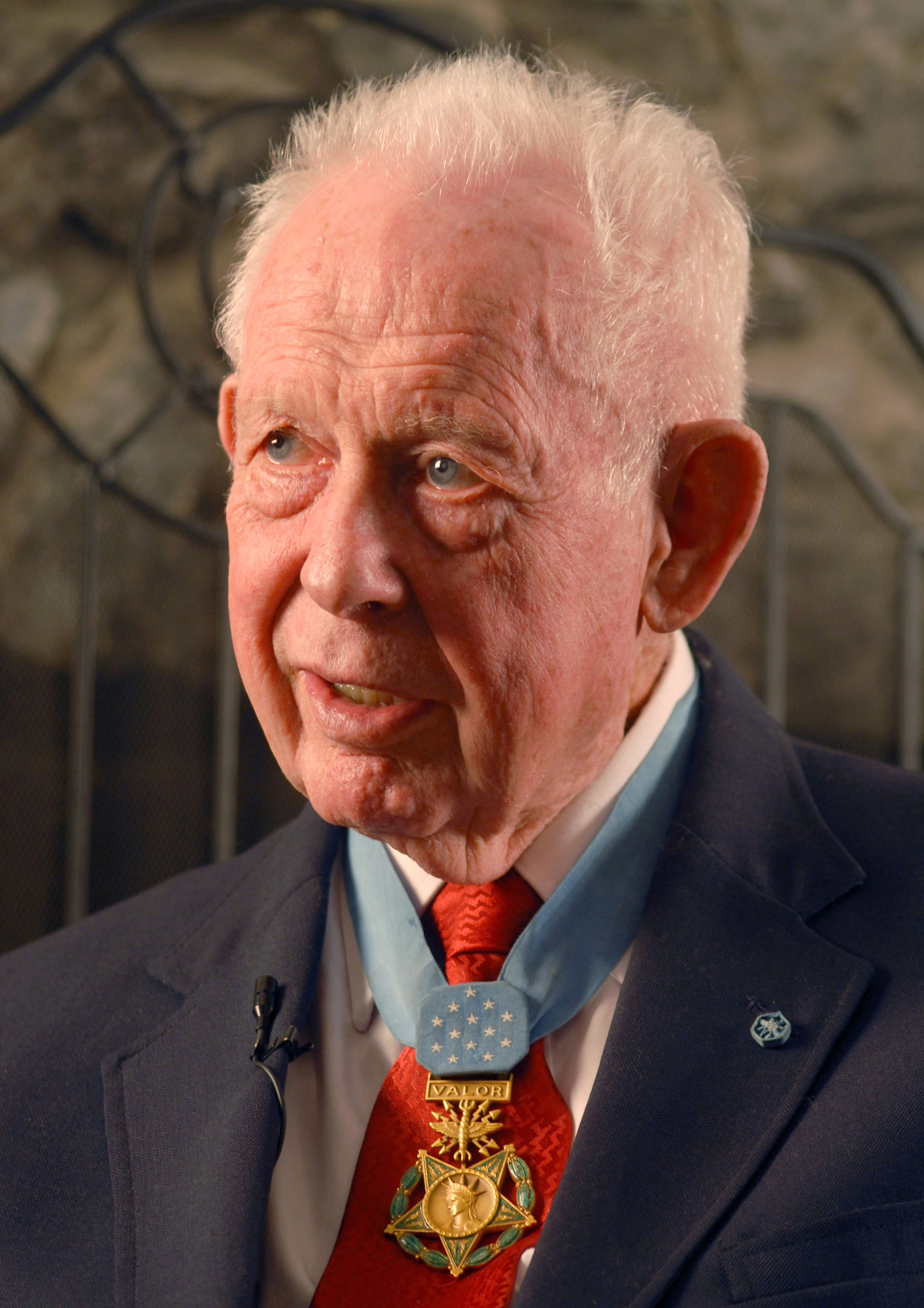 Medal of Honor recipient, retired Col. Bernard F. Fisher, answers questions during an interview Feb 26 at Kunsan Air Base, South Korea. Colonel Fisher was the first living Air Force member to receive the Medal of Honor. Colonel Fisher received the Medal of Honor for heroism during the Vietnam War. (U.S. Air Force photo/Staff Sgt. Darcie Ibidapo) 