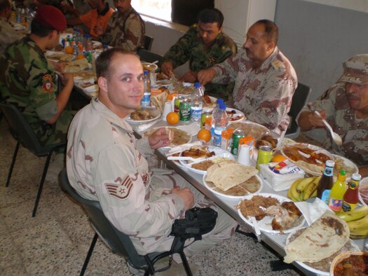 Staff Sgt. Darryn Donaldson attends an appreciation luncheon for Iraq Governor Ma'moun Alwani after an Iraqi Army graduation at Camp Habbaniyah.  
Sergeant Donaldson was deployed with the II Marine Expeditionary Force in Iraq and returned home November 16, 2007. He is assigned to the 23rd Information Operations Squadron at Lackland Air Force Base, Texas.
(Photo by Chief Warrant Officer 2nd Class Glenn Lollar)

