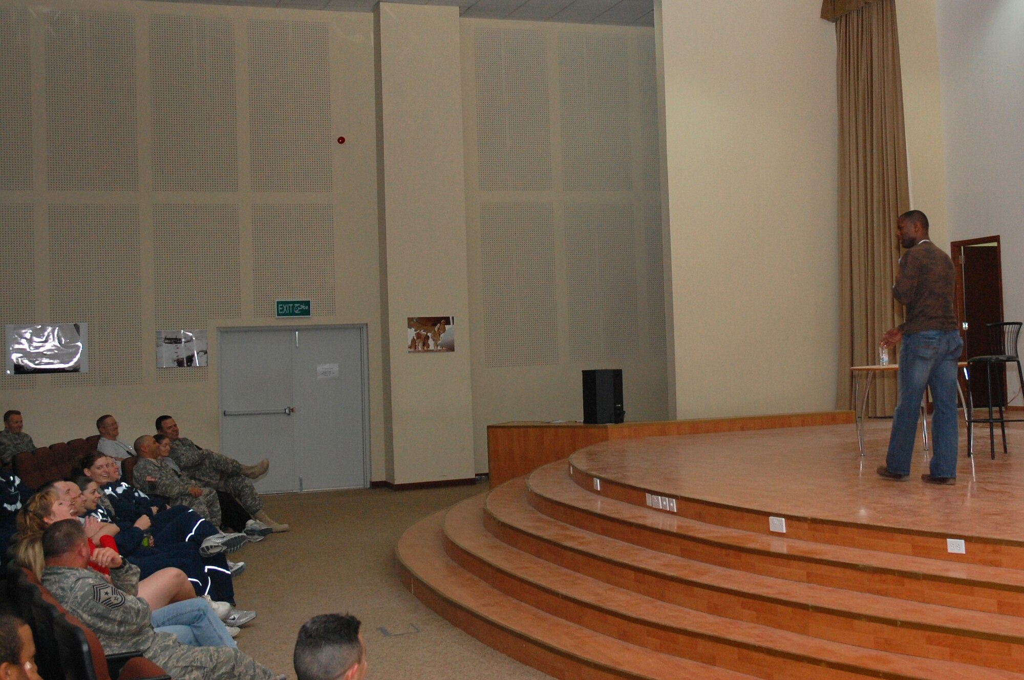 SOUTHWEST ASIA -- Comedian Danta 'Touchee' Jackson entertains members from the 386th Air Expeditionary Wing during a show Feb. 26, 2008 at an air base in the Persian Gulf Region. The comedian is on tour with the Multi-National Corps Iraq, Army Morale Welfare Recreation, Lone Wolf Entertainment Comedy Tour 2008 which provides entertainment to deployed troops in support of Operations Enduring and Iraqi Freedom. (U.S. Air Force photo/ Staff Sgt. Patrick Dixon) 