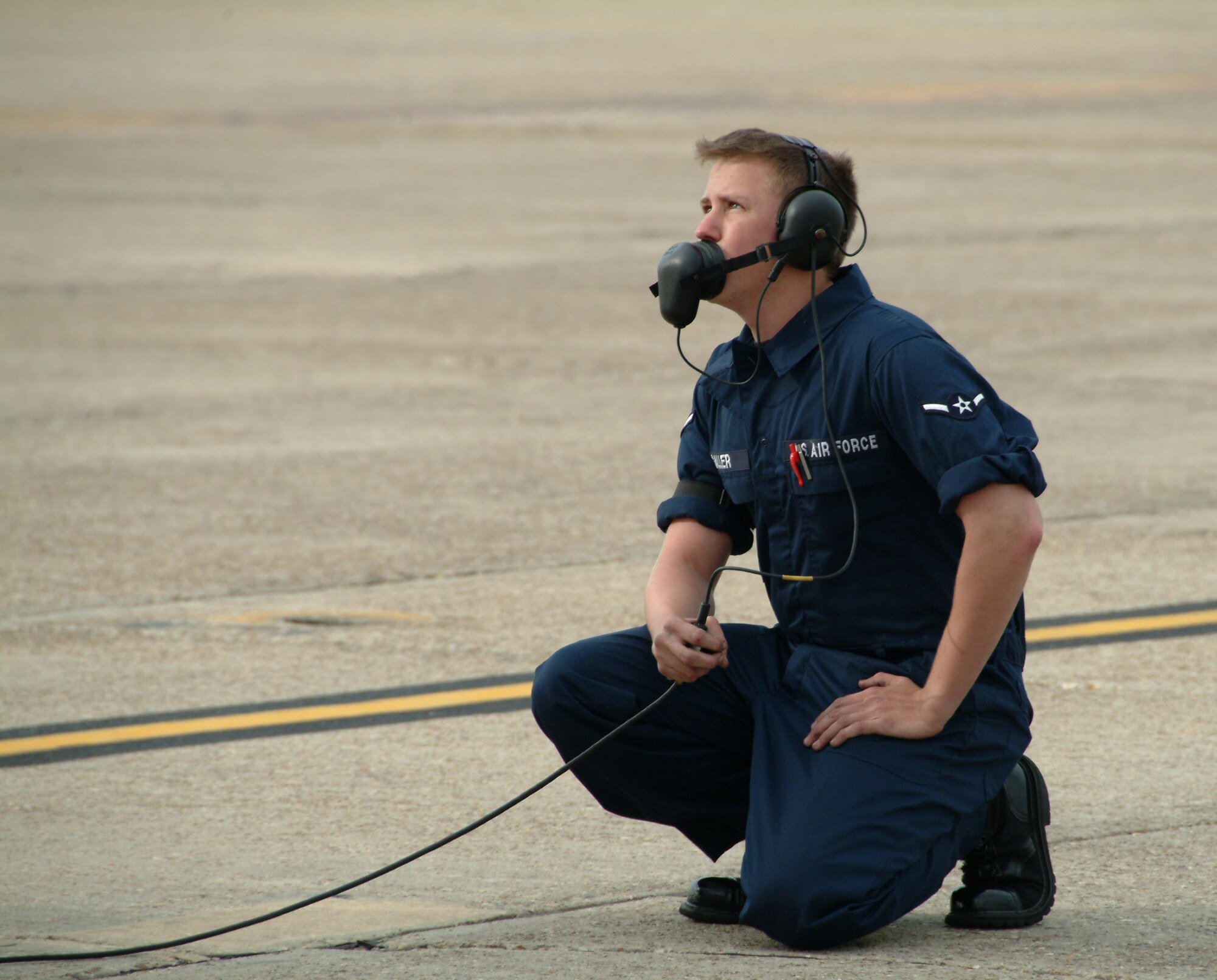 Airman Ryan Galler, 46th Aircraft Maintenance Squadron, talks to pilot Lt. Col. Eugene Booth, 86th Fighter Weapons Squadron, as they perform the final checks before the F-16 Fighting Falcon taxis to the runway Feb. 26 at Eglin Air Force Base, Fla.  U.S. Air Force photo by Staff Sgt. Samuel King Jr.