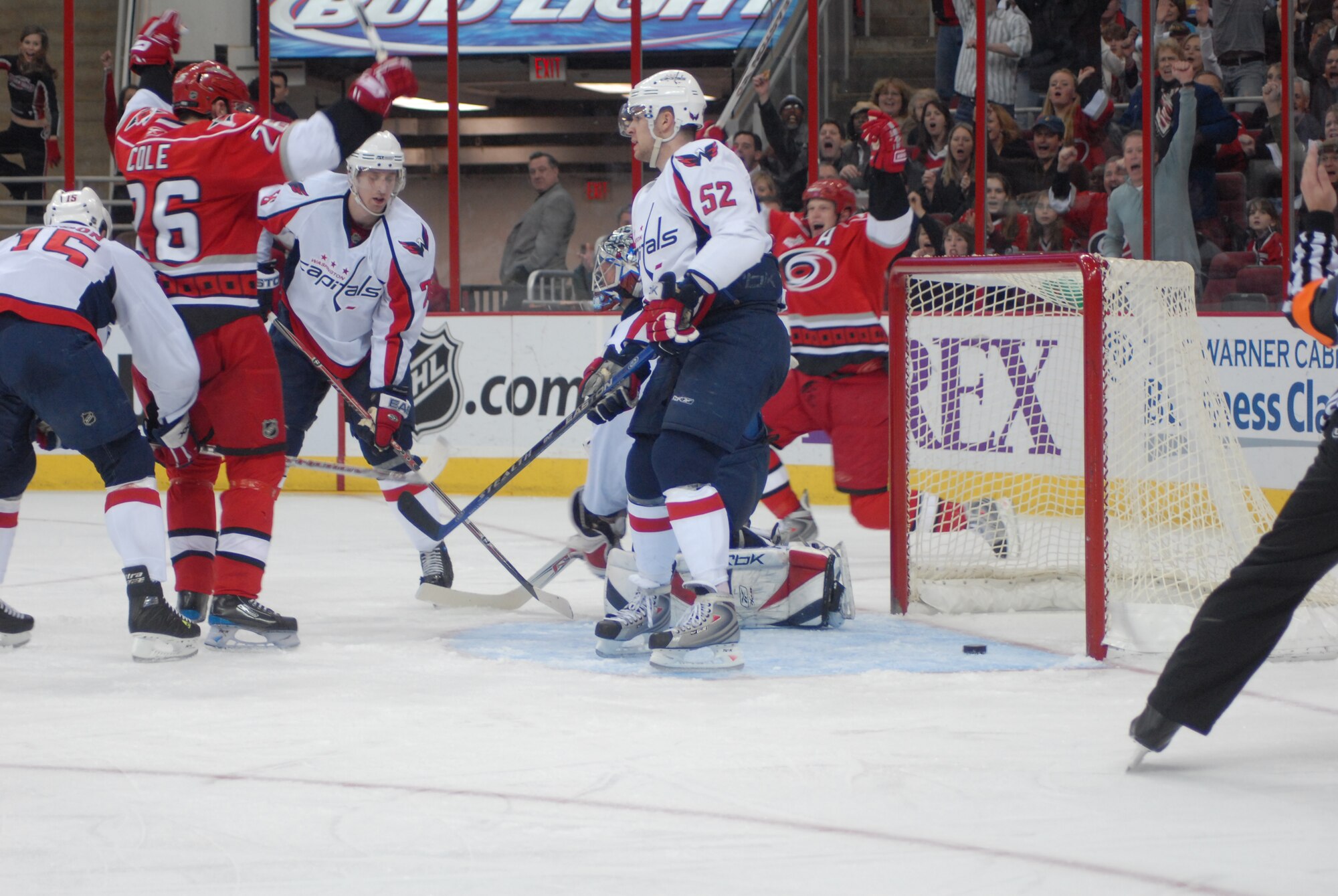 Carolina Hurricanes forwards Erik Cole (26), left, and teammate Eric Staal, right celebrate a goal during Military Appreciation Night Feb. 23 in Raleigh, N.C. Pope received 250 tickets for the NHL game at the RBC Center. (U.S. Air Force Photo by 2nd Lt. Chris Hoyler)