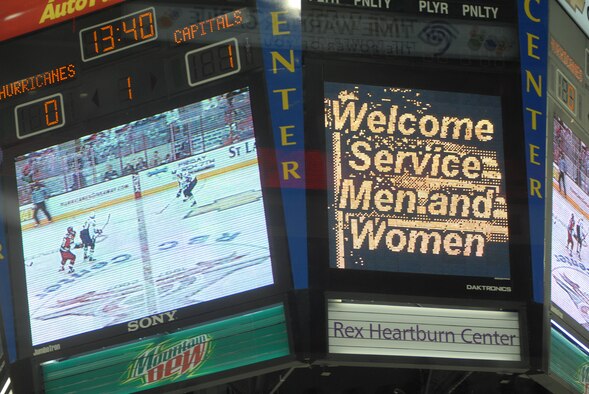 The scoreboard at the RBC Center in Raleigh, N.C. welcomes military members, including Airmen from Pope, to Military Appreciation Night at the National Hockey League game between the Carolina Hurricanes and Washington Capitals Feb. 23. Pope received 250 tickets for the event. (U.S. Air Force Photo by 2nd Lt. Chris Hoyler) 
