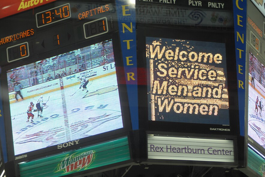 The scoreboard at the RBC Center in Raleigh, N.C. welcomes military members, including Airmen from Pope, to Military Appreciation Night at the National Hockey League game between the Carolina Hurricanes and Washington Capitals Feb. 23. Pope received 250 tickets for the event. (U.S. Air Force Photo by 2nd Lt. Chris Hoyler) 
