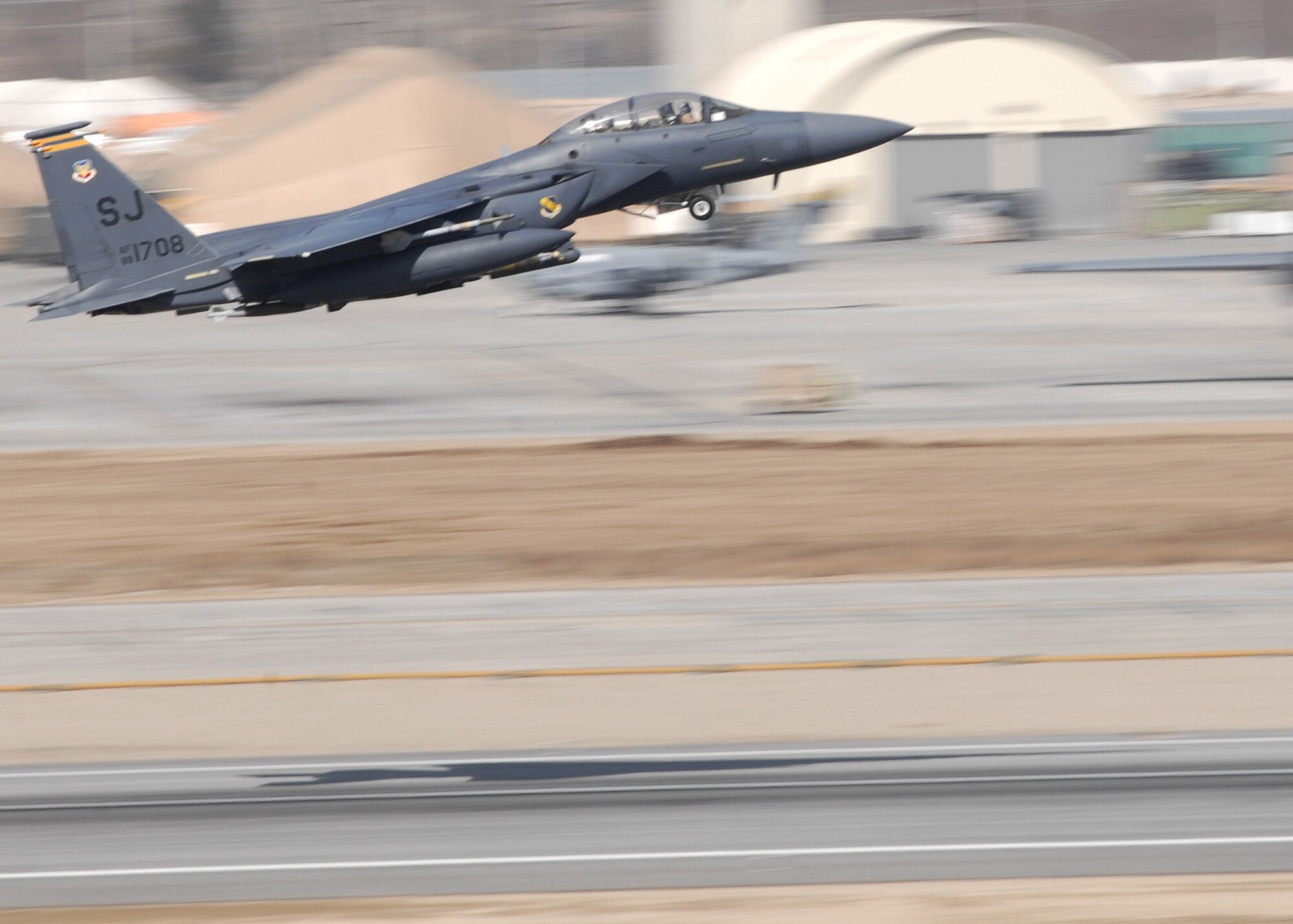 BAGRAM AIR BASE, Afghanistan - A F-15E  from Seymour Johnson Air Force Base, N.C., takes off on a mission supporting Operation ENDURING FREEDOM here Feb. 27. Nearly 20 F-15E Strike Eagles conduct close air support and strike missions throughout Afghanistan on a daily basis. (U.S. Air Force photo by Master Sgt. Demetrius Lester)