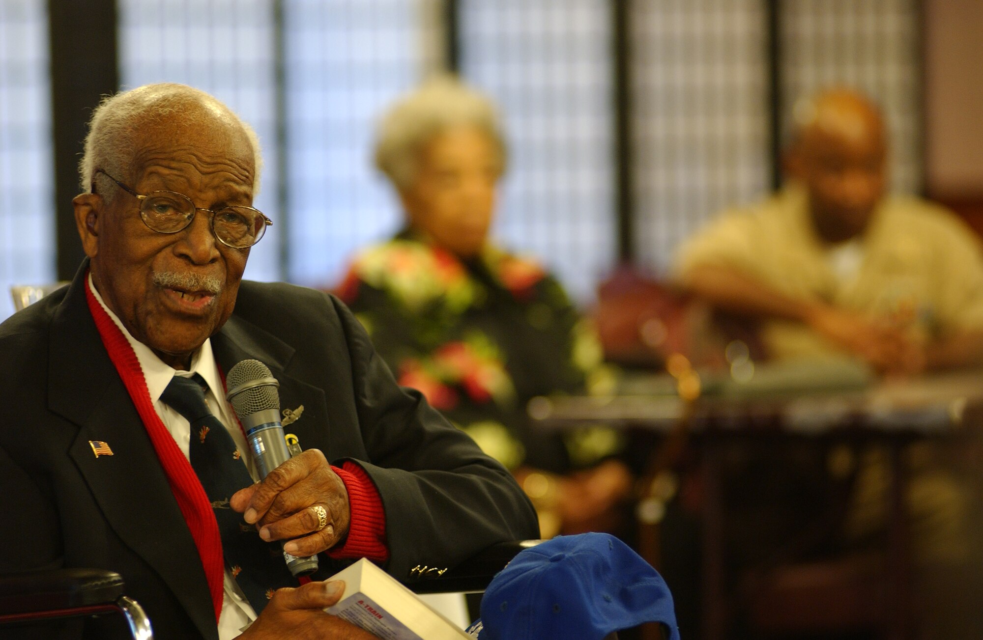 Retired Lt. Col. Charles W. Dryden speaks at the Rocker NCO Club Feb. 25. to inform people the important role Tuskegee Airmen had during World War II. 
(U.S. Air Force photo/Tech. Sgt. Rey Ramon)

