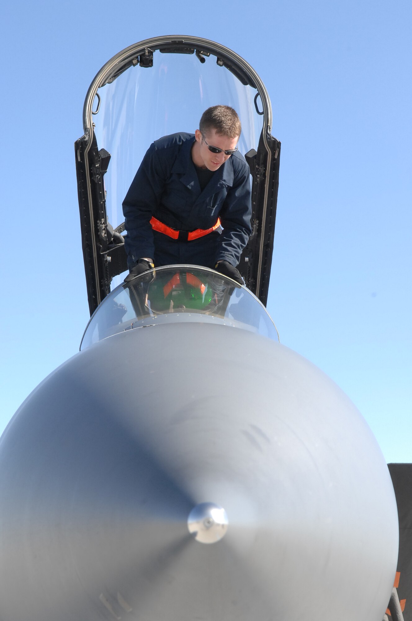 MOUNTAIN HOME AIR FORCE BASE, Idaho - Staff Sgt. Anthony Barrett, 391st Aircraft Maintenance Unit crew chief, checks the window screen and hood assembly of an F-15E Strike Eagle for damage following the recovery of the aircraft during Exercise Sharpshooter 08-04.1 Feb. 28. The 366th Fighter Wing conducts exercises to prepare personnel and equipment for the upcoming March 2008 Operational Readiness Inspection. (U.S. Air Force photo by Staff Sgt. Kathy Parker) 