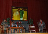 During the Larry O'Reily show, the fictitious talk show in "That Guy," the acting team from Pope AFB, N.C., turn to watch hidden video of their weekend. The program is a 50-minute skit created by a Pope AFB Airman that tackles binge drinking. The group performed seven times while at Lackland AFB, Texas, Feb. 24 and 25.  (USAF photo by Alan Boedeker)