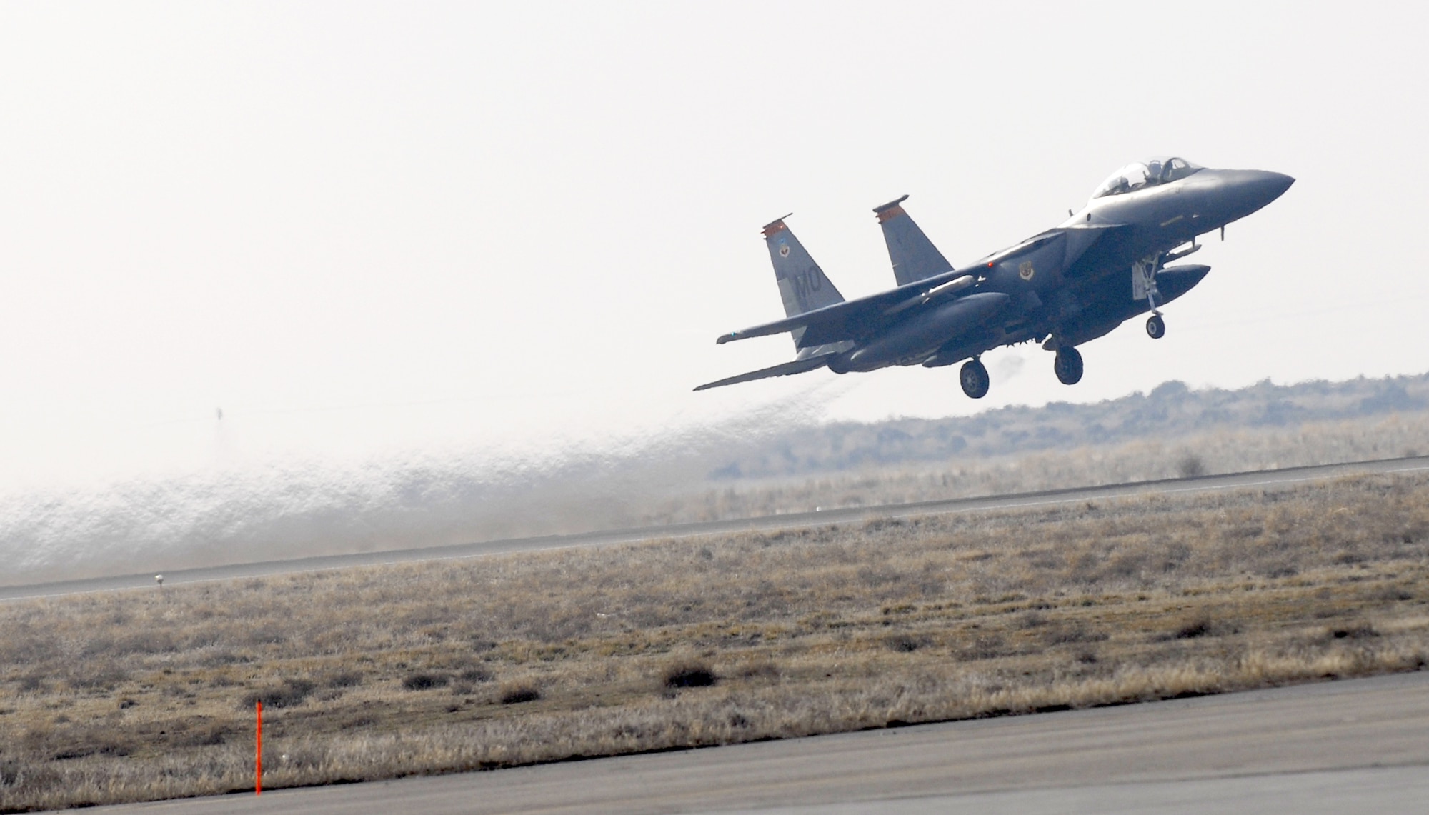 MOUNTAIN HOME AIR FORCE BASE, Idaho – An F-15E Strike Eagle from the 391st Fighter Squadron, takes off to the simulated deployed location during Exercise Sharpshooter 08-04.1 Feb. 28. During the Phase I exercise, a main objective is to deploy a predetermined number of jets from each squadron to the simulated deployed location.  The 366th Fighter Wing conducts exercises to prepare personnel and equipment for the upcoming March 2008 Operational Readiness Inspection. (U.S. Air Force photo/ Airman 1st Class Ryan Crane) 