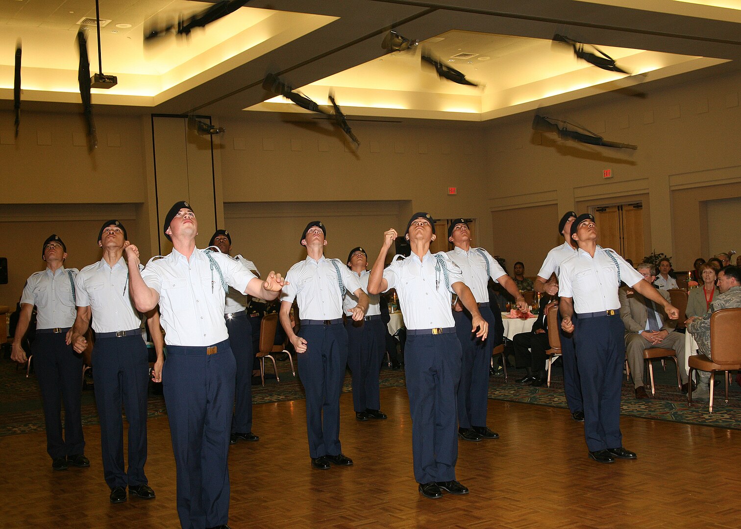 The John Jay High School Junior ROTC male group performs during the African American Heritage Committee luncheon Feb. 15 at the Gateway Club on Lackland Air Force Base, Texas. More than 370 members of Team Lackland attended the event. (USAF photo by Robbin Cresswell)
