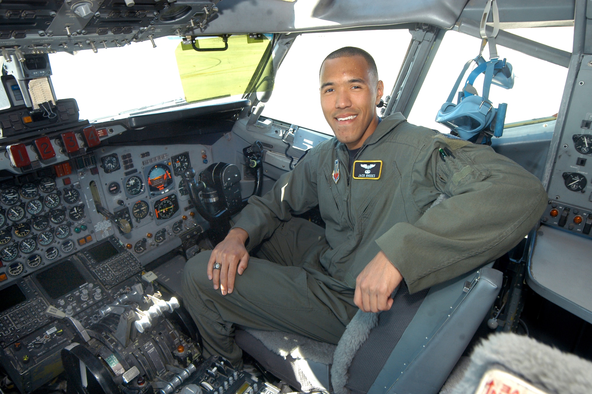 Captain Jack Rhodes, an instructor air weapons officer for Joint Surveillance and Target Attack Radar System aircraft in the 330th Combat Training Squadron in the 116th Air Control Wing, sits in the cockpit of an E-8C JSTARS aircraft. The captain is one of 32 officers Air Force-wide to be accepted into the Specialized Undergraduate Pilot Training program.  U.S. Air Force photo by Sue Sapp 