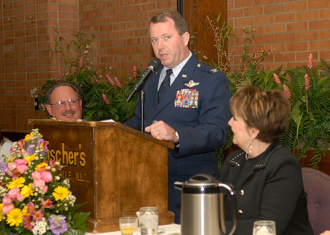 Col. Al Hunt, 375th Airlift Wing commander, provides an inspirational message as Belleville Mayor Mark Eckert (left) and Patty Gregory (right) listen during the 43rd Mayor’s Prayer Breakfast at Fischer’s Restaurant in Belleville Feb. 27. (Photo by Airman 1st Class Megan Gilliland)