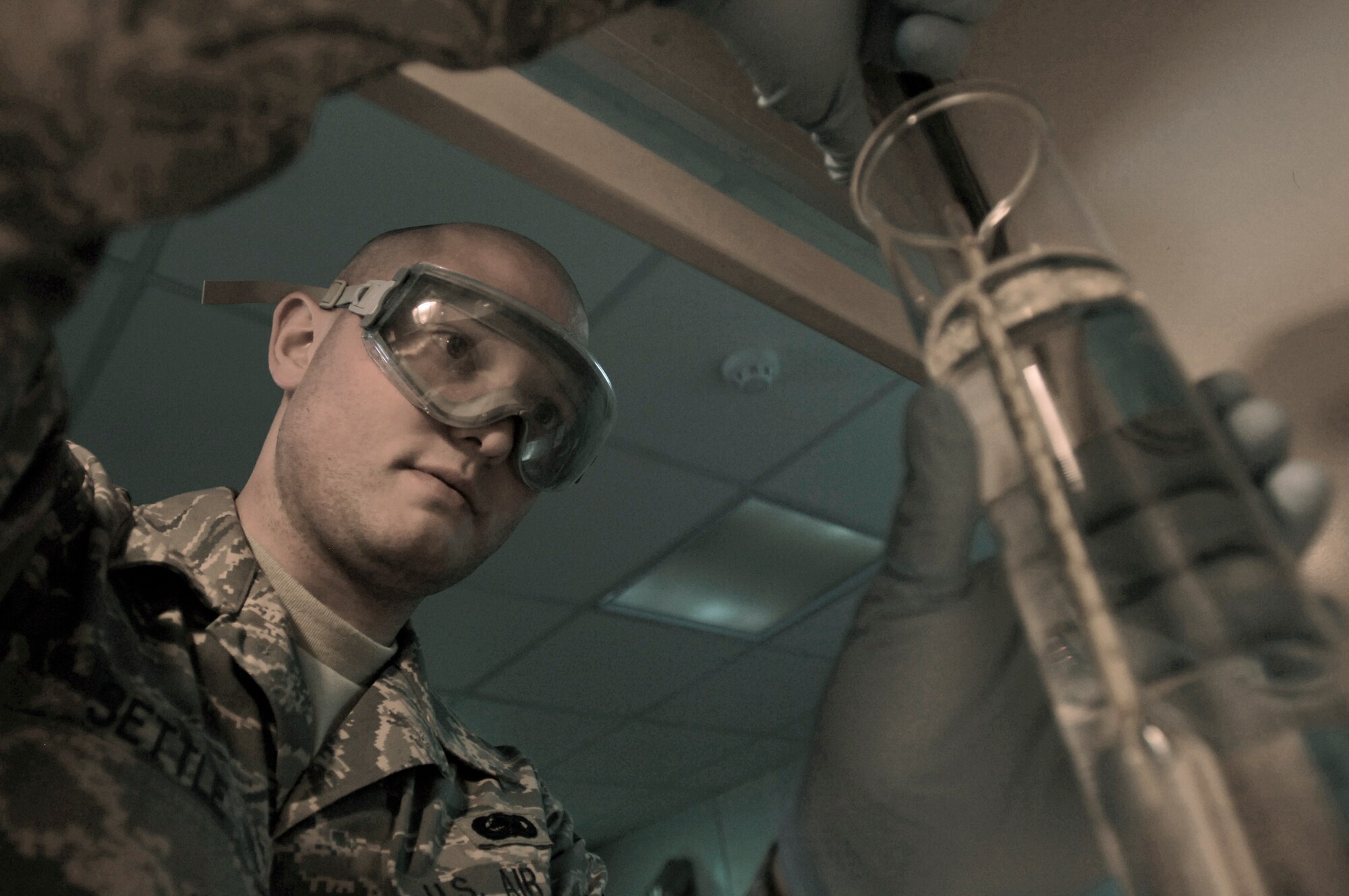 Staff Sgt. Frederick Settle examines the reading on the hydrometer during a fuels gravity test Feb. 27 in Southwest Asia. The fuels management flight is responsible for inventorying the fuel daily, and the transfer and issue of fuel to both vehicle operators and aircrews in support of operations Enduring Freedom and Iraqi Freedom. Sergeant Settle is a fuels lab technician from the 386th Expeditionary Logistics Readiness Squadron. (U.S. Air Force photo/Staff Sgt. Patrick Dixon) 