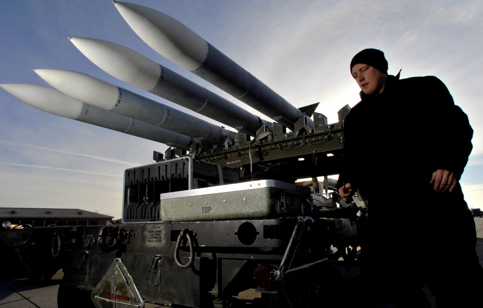 MOUNTAIN HOME AIR FORCE BASE, Idaho - Airman 1st Class Marshall Meyer, 389th Aircraft Maintenance Unit weapons load crew member,  does his final walk around inspection before he loads an AIM-120 missile onto an F-15E Strike Eagle during Exercise Sharpshooter 08-04.1 Feb. 27. Maintenance crews are working throughout the Phase I to prepare deploying jets to leave for the simulated deployed location.  The 366th Fighter Wing conducts exercises to prepare personnel and equipment for the upcoming March 2008 Operational Readiness Inspection. (U.S. Air Force photo/ Airman 1st Class Ryan Crane)
