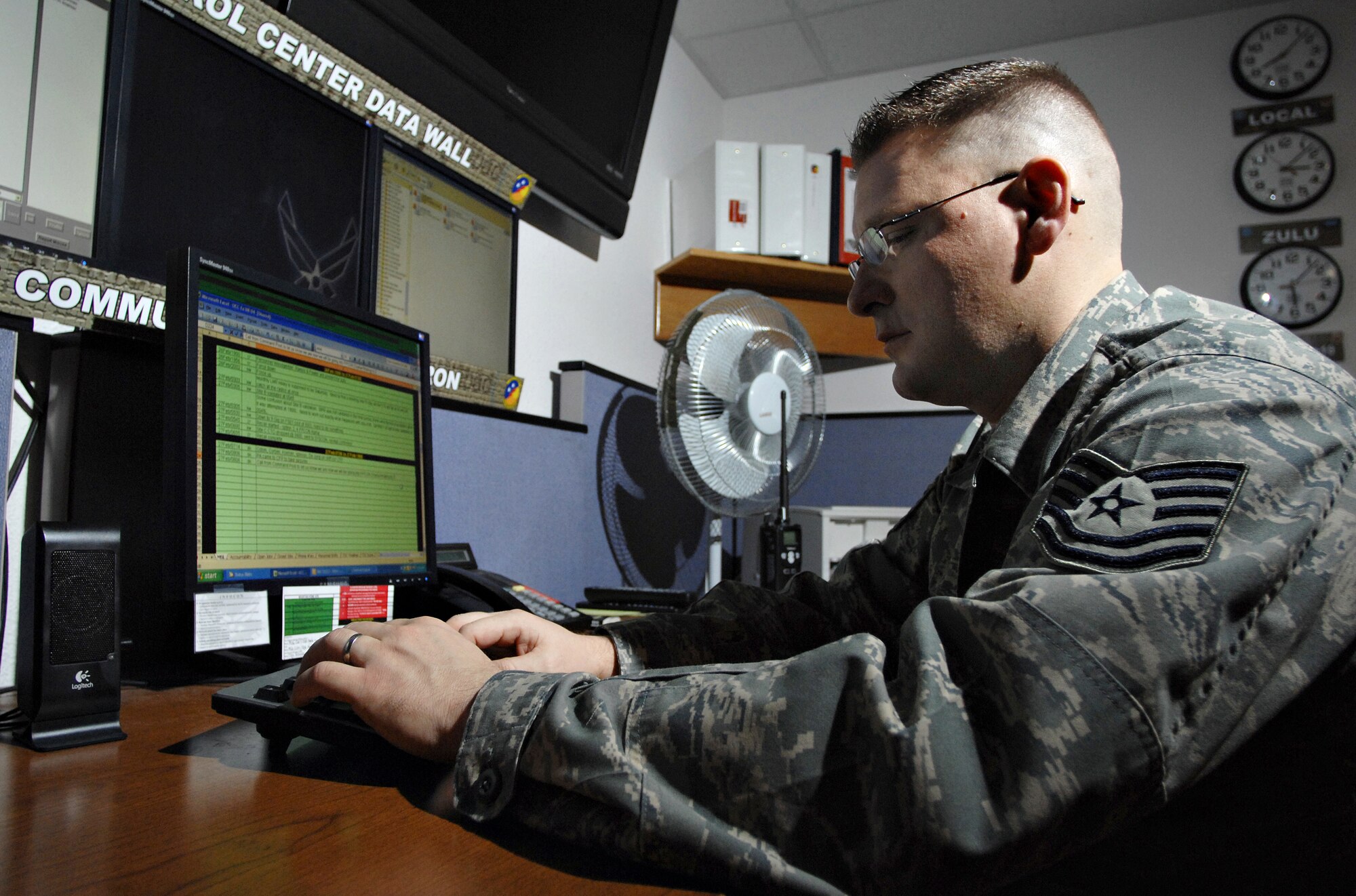 MOUNTAIN HOME AIR FORCE BASE, Idaho - Tech. Sgt. Adam Koehler, 366th Communications Squadron plans noncommissioned officer in charge, updates the exercise force protection level in the squadron unit control center during Exercise Sharpshooter 08-04.1, Feb. 27. The communications squadron helps support the wing's flying mission by providing secure and reliable communication during the exercise.  The 366th Fighter Wing conducts exercises to prepare personnel and equipment for the upcoming March 2008 Operational Readiness Inspection. (U.S. Air Force photo/ Airman 1st Class Ryan Crane) 