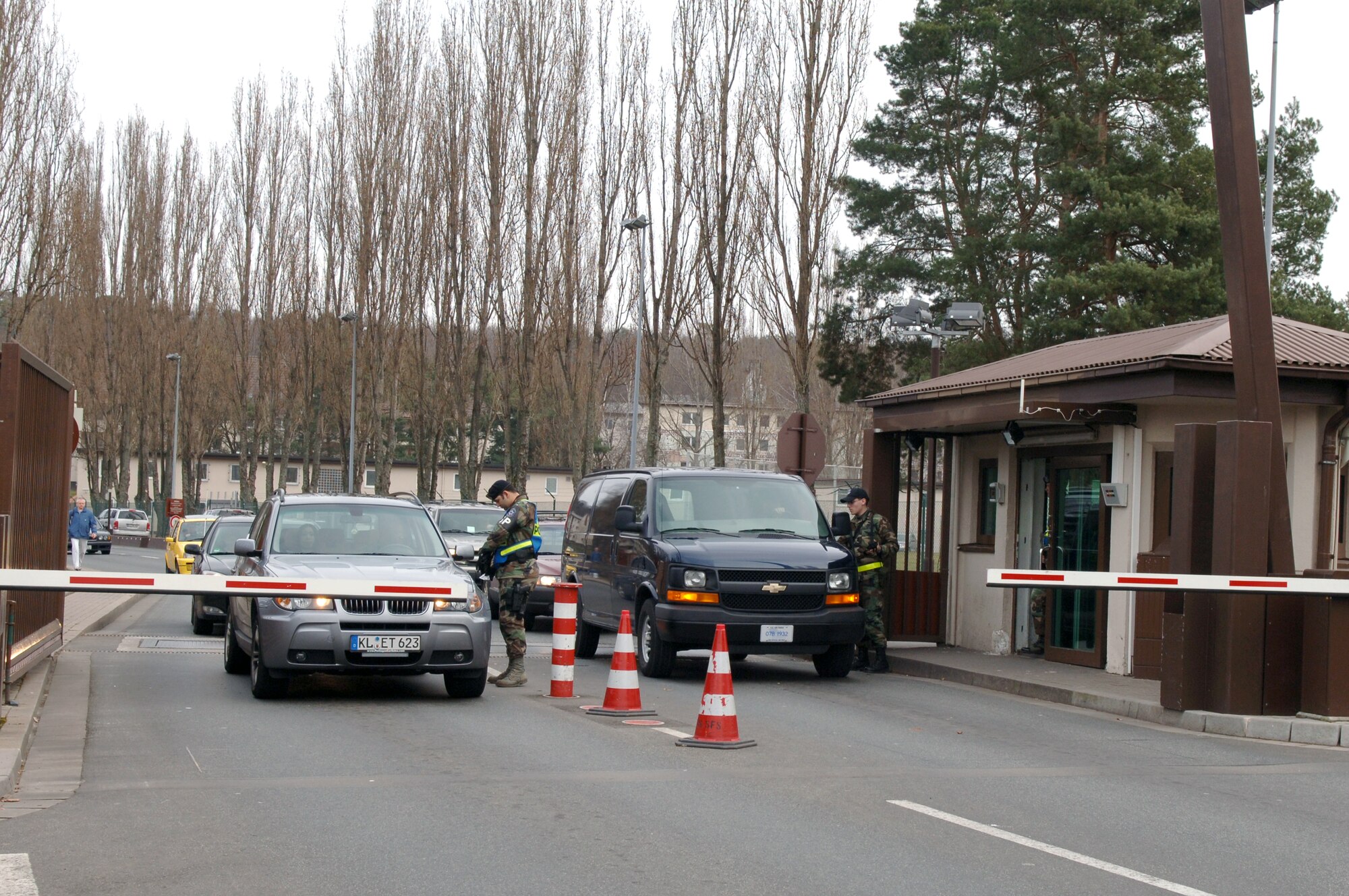 Members of the 569th U.S. Forces Police Squadron check IDs at the Vogelweh main gate Feb. 28. Photo by Airman 1st Class Kelly LeGuillon