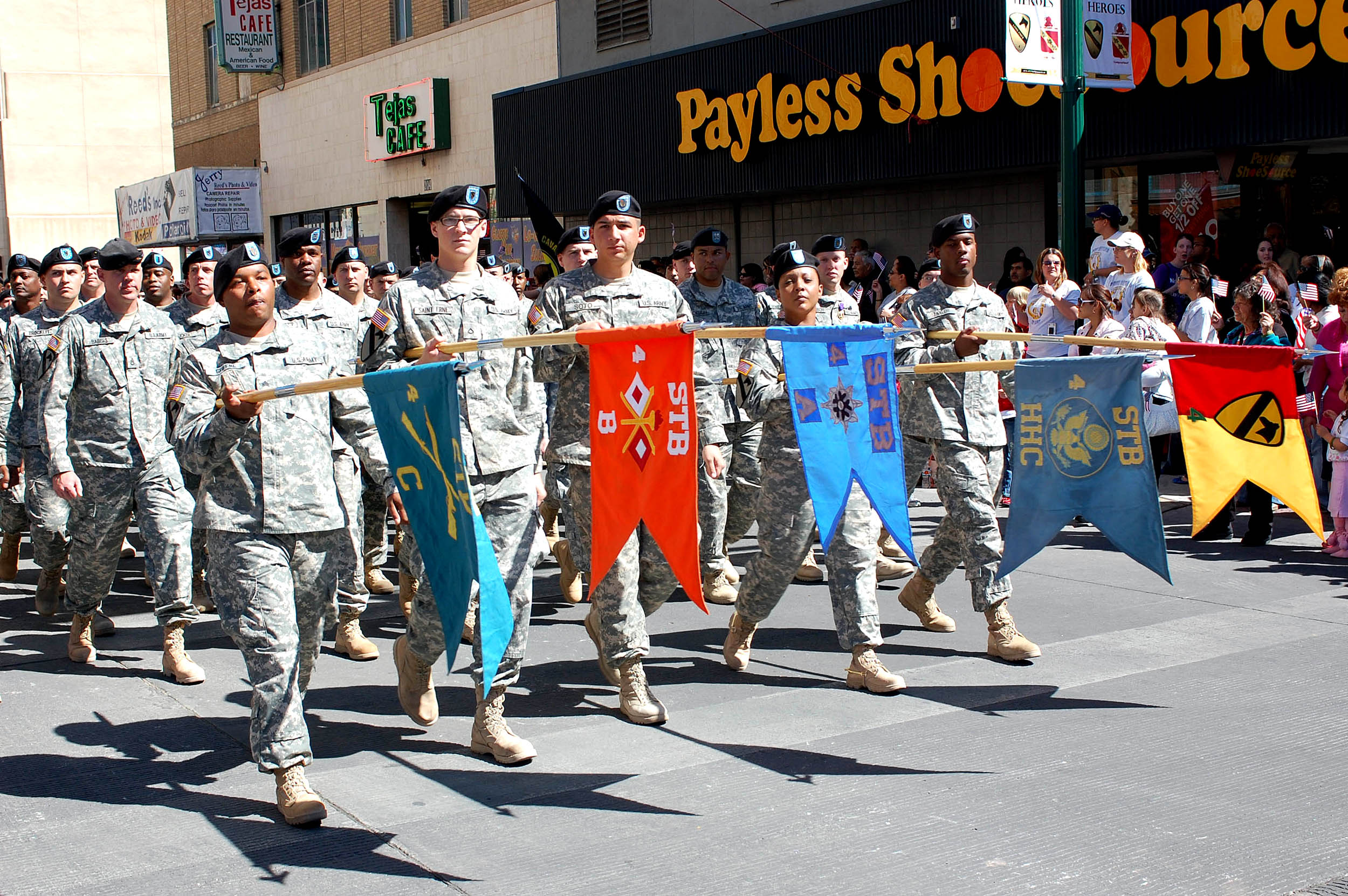 unit-guidons-dip-their-flags-in-a-salute-as-the-soldiers-file-past-the