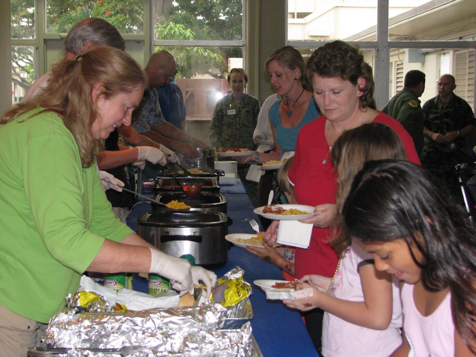 Deployed/remote-tour family members were served dinner by Hickam Nelles Chapel volunteers during the Airman and Family Readiness Center’s monthly activity dinner. 