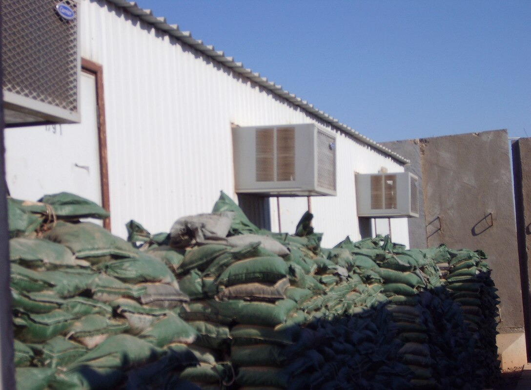 Pictured above is the trailer that Staff Sgt. Mike Grunwald lived in during his recent deployment to Iraq. "You live surrounded by a maze of concrete blast walls and sand bags," Sergeant Grunwald said. (U.S. Air Force photo/Staff Sgt. Mike Grunwald)