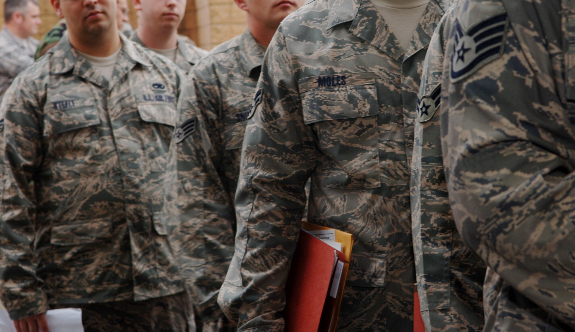 MOODY AIR FORCE BASE, Ga. -- Deploying members of the 723rd Aircraft Maintenance Squadron stand in line for deployment processing here Feb. 22.  The 723rd AMXS recently left for a deployment to Iraq in support of the war on terror.  (U.S. Air Force photo by Senior Airman Schelli Jones)