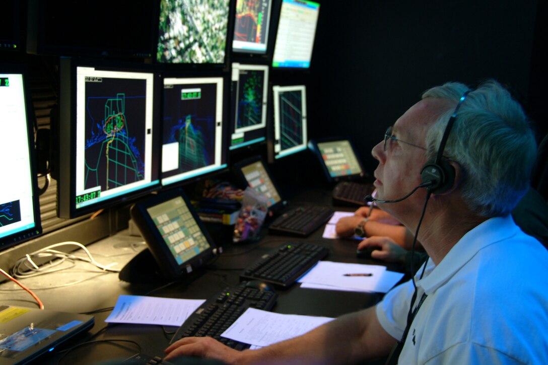 EGLIN AIR FORCE BASE, Fla. – John Crane, 36th Electronic Warfare Squadron B-1 defense systems engineer, monitors the B-1 Tail Warning Function test at the Central Control Facility at Eglin Air Force Base, Fla., Feb. 25. The TWF is a radar that faces the rear of B-1 to detect incoming missiles or aircraft. If detected the system can deploy defensive countermeasures. Crews from the 337th Test and Evaluation Squadron, Dyess Air Force Base, Texas, and fellow 53d Wing aircrew flew the B-1 mission at the Eglin range. (U.S. Air Force photo Capt. Carrie Kessler)