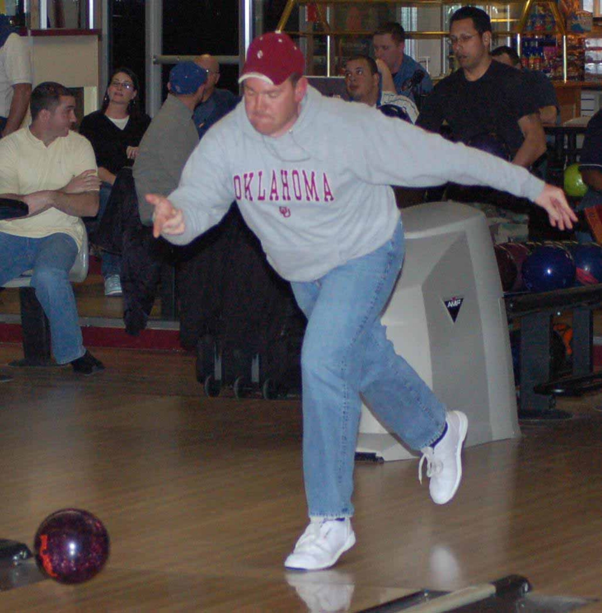 Charles Williams, 654th CLSS bowler, delivers one of the 12 strikes he threw Feb. 20 on the way to a perfect 300 game. This was the first perfect game of Williams' bowling career.  (Air Force photo by John E. Banks)