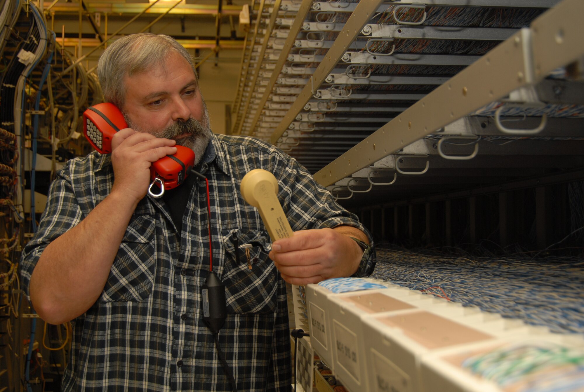 David Purcell, 95th Communication Squadron telecommunications technician, is the Team Edwards Technician Civilian of the Fourth Quarter. During the quarter, he led a telephone software upgrade worth $1.3 million and engineered a high speed data link to support the Northrop Grumman Global Hawk flight test program. (Air Force photo by Senior Airman Julius Delos Reyes)