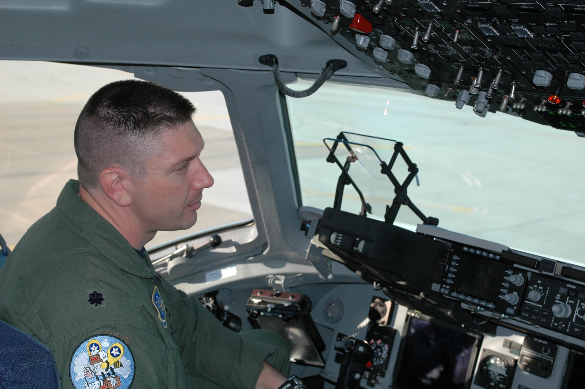 Lt. Col. William Spangenthal, 21st AS commander, prepares for a local flight in a C-17 Globemaster III Feb. 14. Colonel Spangenthal flew part of his squadron on its first deployment Feb. 25. (U.S. Air Force photo/Tech. Sgt. Matthew McGovern)