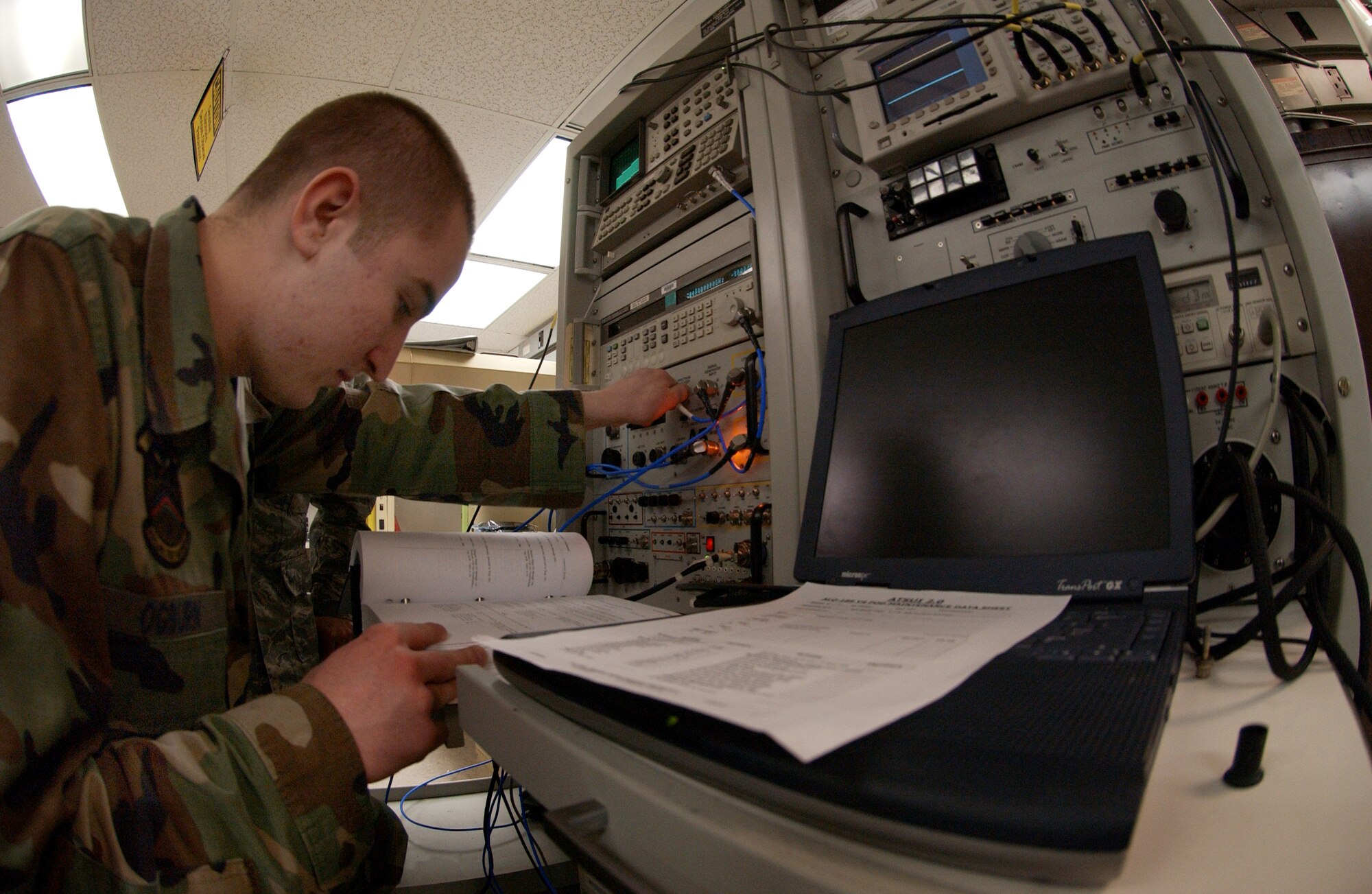 EIELSON AIR FORCE BASE, Alaska -- Airman 1st Class Timothy Ogburn programs a spectrum analyzer, which helps operate the 188 Electronic Attack Pod, Feb. 27, 2008 at the avionics flight building. The EA pods maintained by the avionics flight for Alaska's harsh arctic winters, provide an offensive electronic attack that degrades an enemy aircraft's radar. Airman Ogburn is an electronic warfare journeyman assigned to the 354th Maintenance Squadron here. (U.S. Air Force photo by Airman 1st Class Christopher Griffin) 