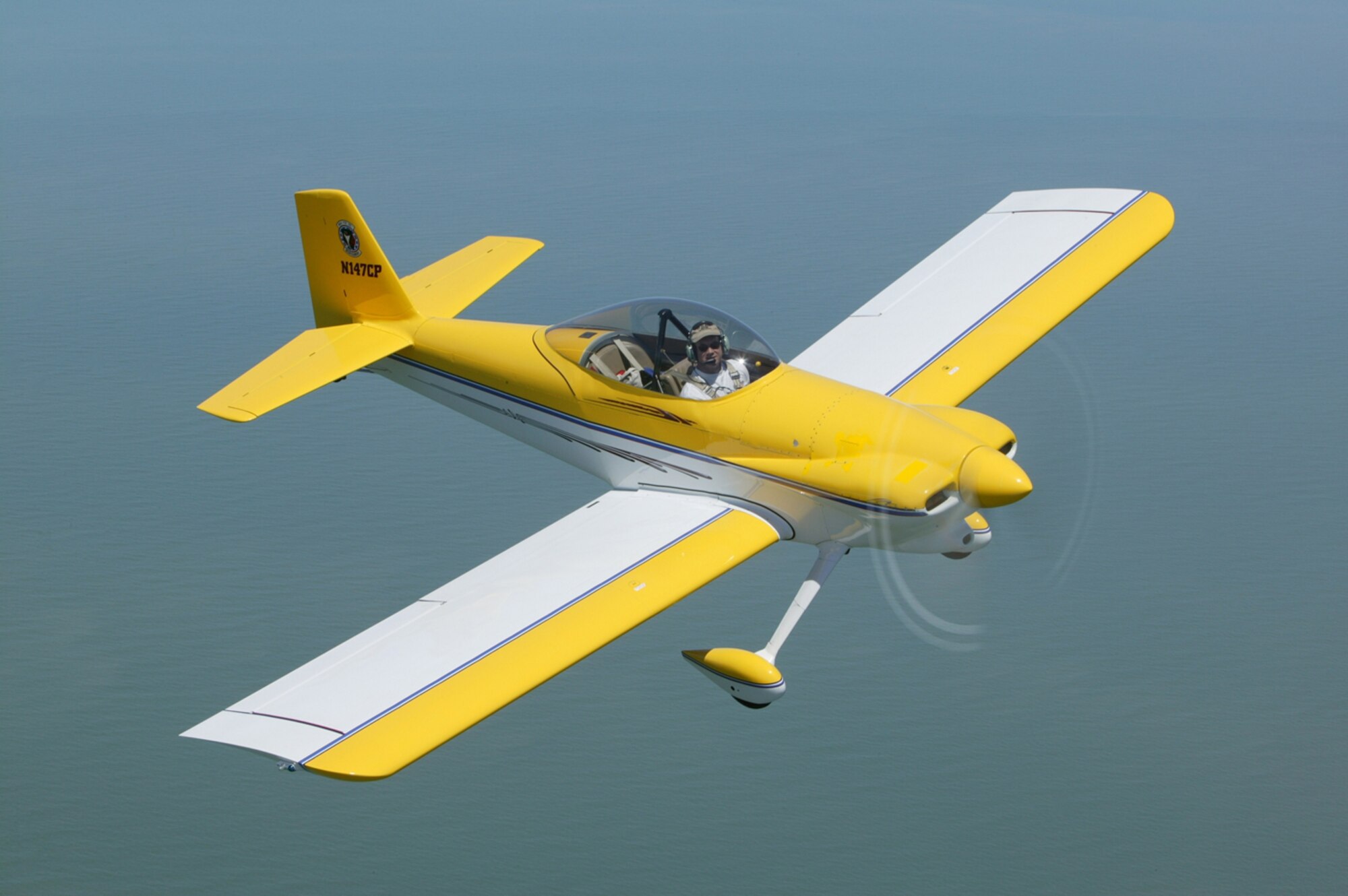 Flying his experimental aircraft, Lt. Col. Edward Linch III warns military pilots to watch out for civilian light aircraft like his"Can's RV-4," which has a top speed of 210 mph and is fully aerobatic. Such aircraft do fly in military operating areas. If the pilots aren't watching for each other, there is a high risk of midair collision. (photo by Jim Koepnik)