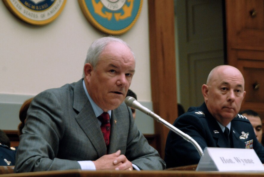 Secretary of the Air Force Michael W. Wynne and Air Force Chief of Staff Gen. T. Michael Moseley answer questions on Capitol Hill Feb. 27 in Washington, D.C. The leaders outlined how the upcoming year's budget will focus on the Air Force's top three priorities: Winning today's fight, taking care of people and preparing for tomorrow's challenges. (U. S. Air Force photo/Tech. Sgt. Cohen A. Young) 