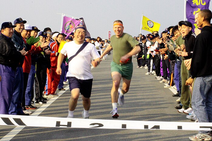 In the Iwakuni 2008 Ekiden race, the commanding officers ran the last of the 17 legs for each team. Col. Michael A. O?Halloran, station commanding officer, sprinted the last stretch to the finish line in an attempt to catch Cmdr. Tsuyoshi Nishiura, commanding officer of Japanese Maritime Self-Defense Force Squadron 91.