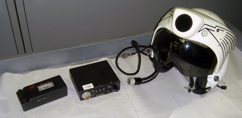 The purpose of the Laser Acquisition Device (L.A.D.) is to give the pilot the location of a ground target that is being illuminated by a laser designator. This is done by detecting the laser energy return for the illuminated direction of the target. By mounting the detector, optical system and display on the pilot's helmet, targets may be sighted over a large viewing area. (U.S. Air Force photo)