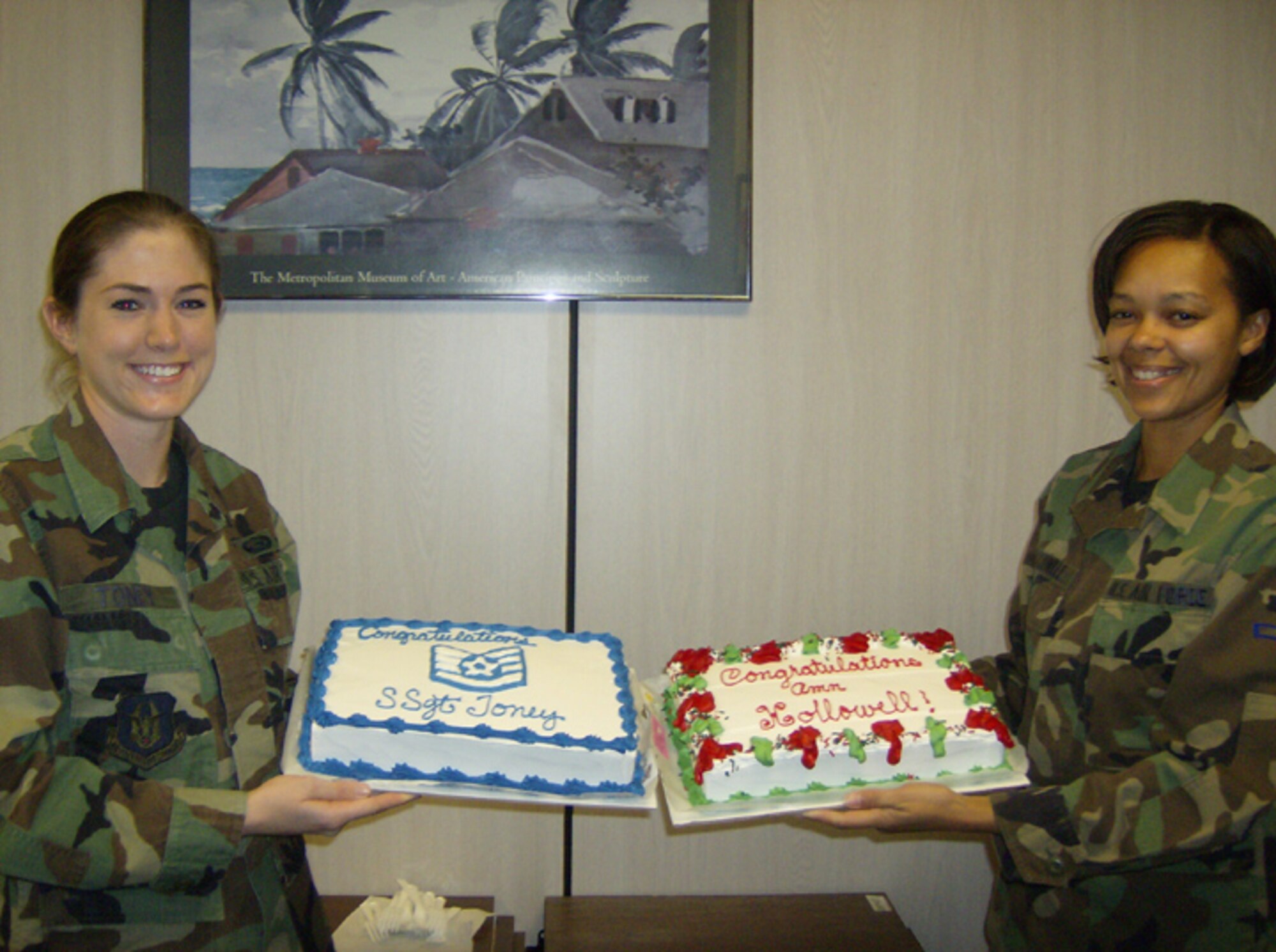 SEYMOUR JOHNSON AIR FORCE BASE, N.C-- Staff Sgt. Shelley Toney (left) and Airman Carla Hollowell were promoted during the December Unit Training Assembly. Both are reservists with the 916th Mission Support Flight.