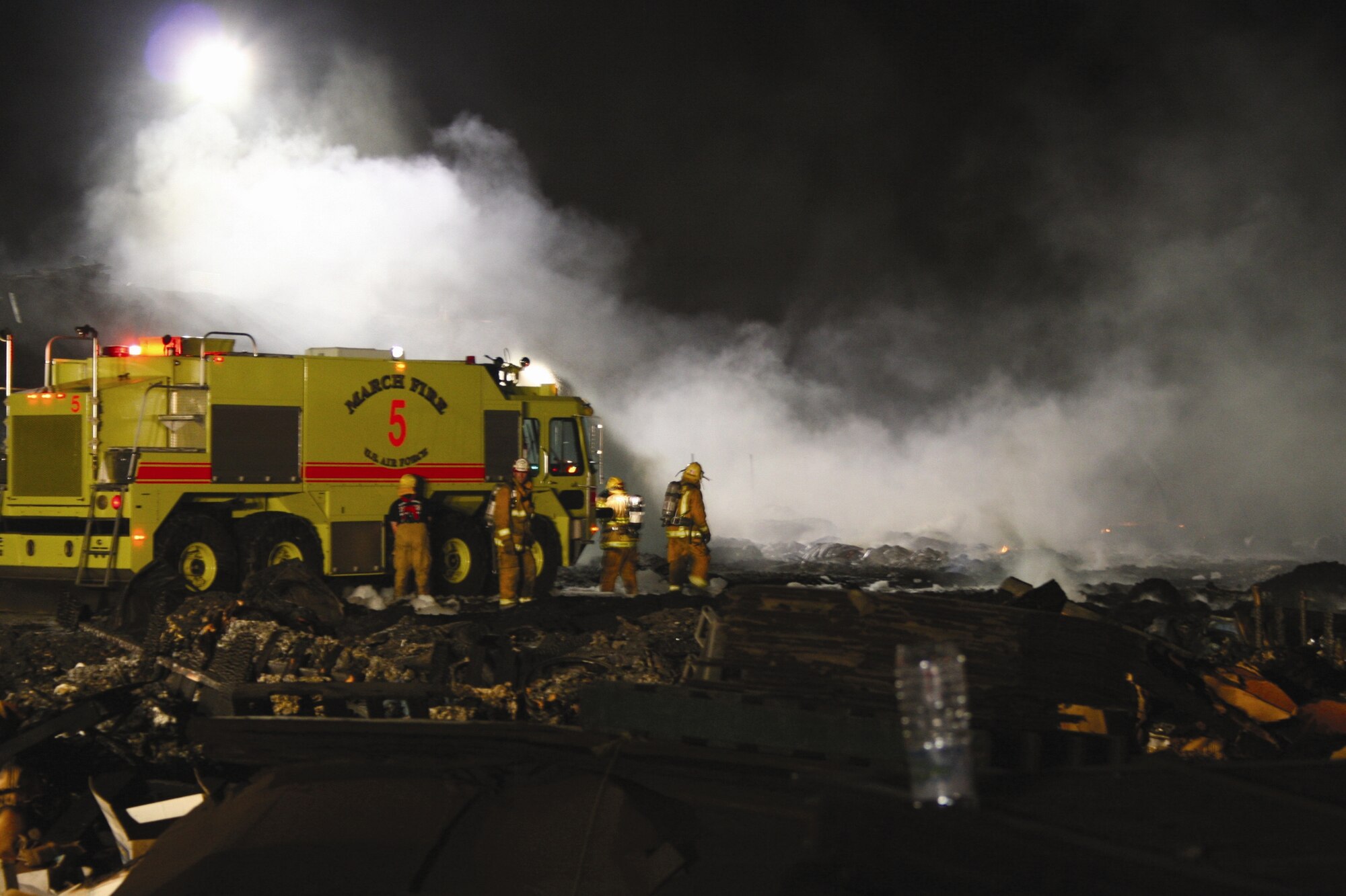 The March Air Reserve Base Fire Department joined over 100 firefighters to assist at a fire at a plastic recycling business in Riverside June 26. A major highway and railroad were shut down for over four hours. Also assisting Riverside City Fire were departments from Riverside County/CAL Fire, Colton, Rialto and San Bernardino County.  Estimated loss of product from the fire was $250,000. (Courtesy photo by Mike Esparza)